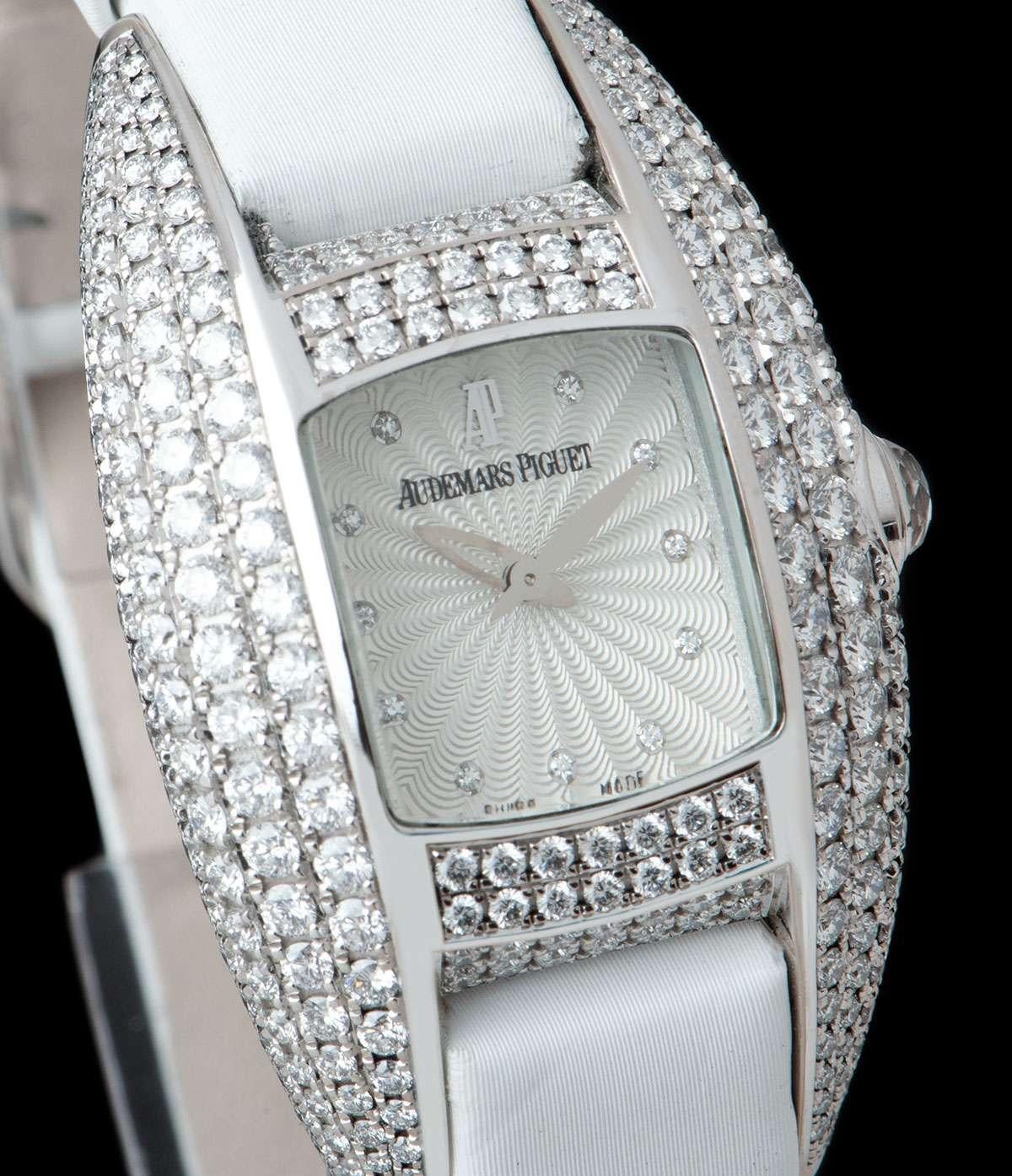 An 18k White Gold Dream Ladies Wristwatch 67496BC.ZZ.A011SU.01, silver guilloche dial with 11 applied round brilliant cut diamond hour markers, a fixed 18k white gold bezel and 18k white gold case set with a total of approximately 260 round