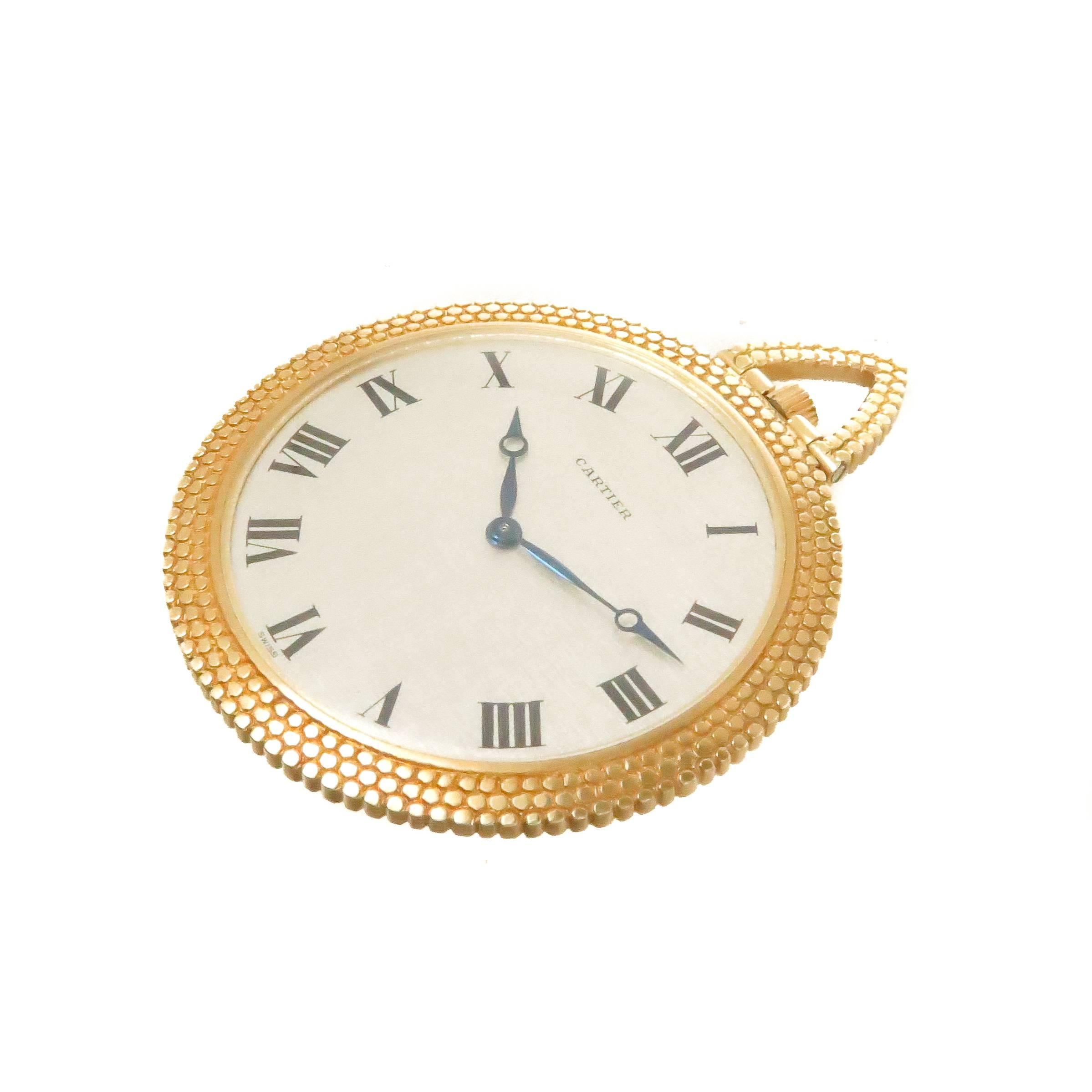 Circa 1970s Audemars Piguet for Cartier Gents Pocket watch, 40 MM Diameter X 4 MM thick 18K Yellow Gold case with a Beaded Border. 17 Jewel mechanical, Manual Wind Audemars Piguet  movement. Silvered Dial with Black Roman numerals. Comes in a