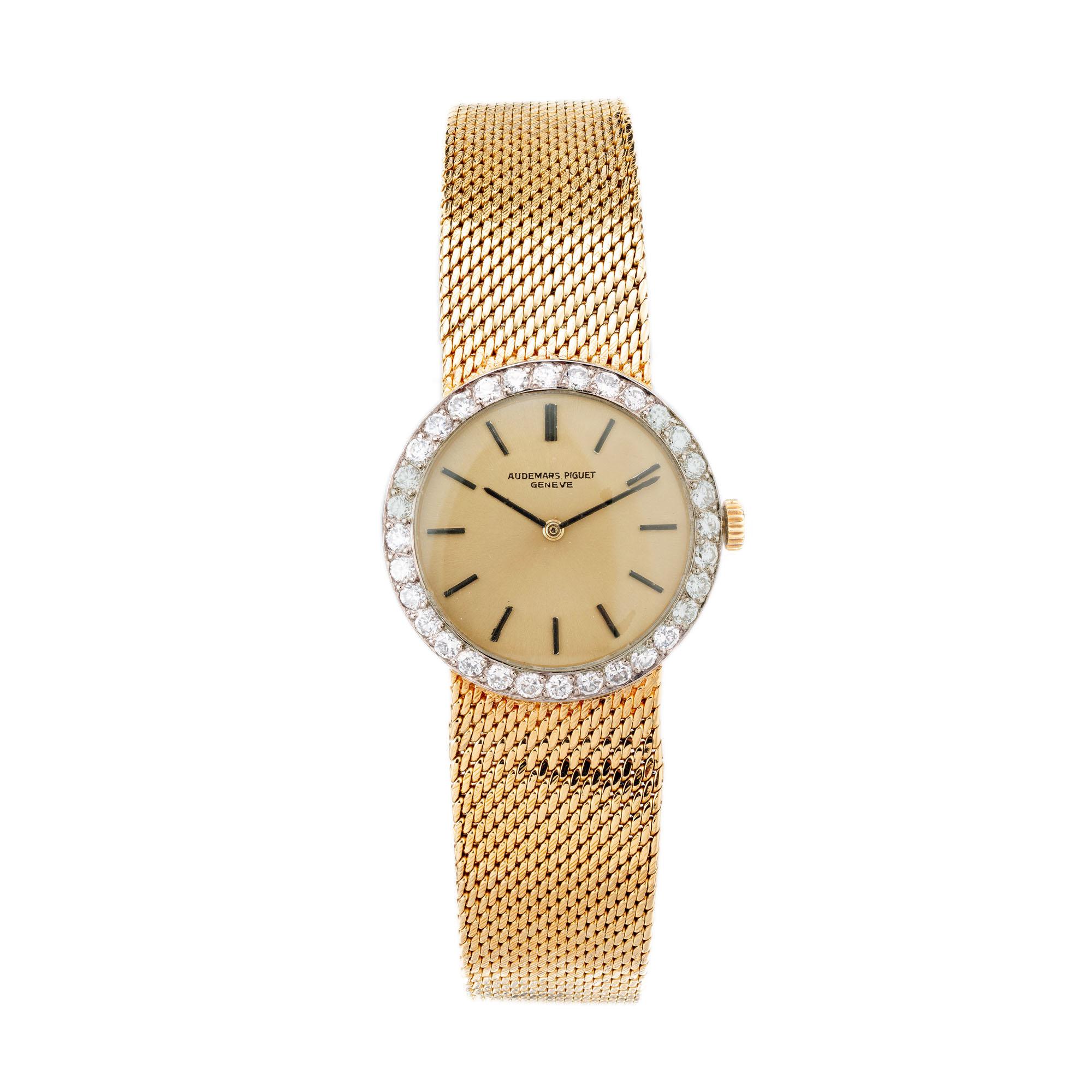 Audemars Piguet ladies 18k yellow gold diamond wristwatch with 18k yellow gold original mesh band. White gold bezel with 32 round cut accent diamonds.  6.5 to 6.75 inches in length. 

32 round diamonds, approx total weight: .64cts, VS, G
Length: