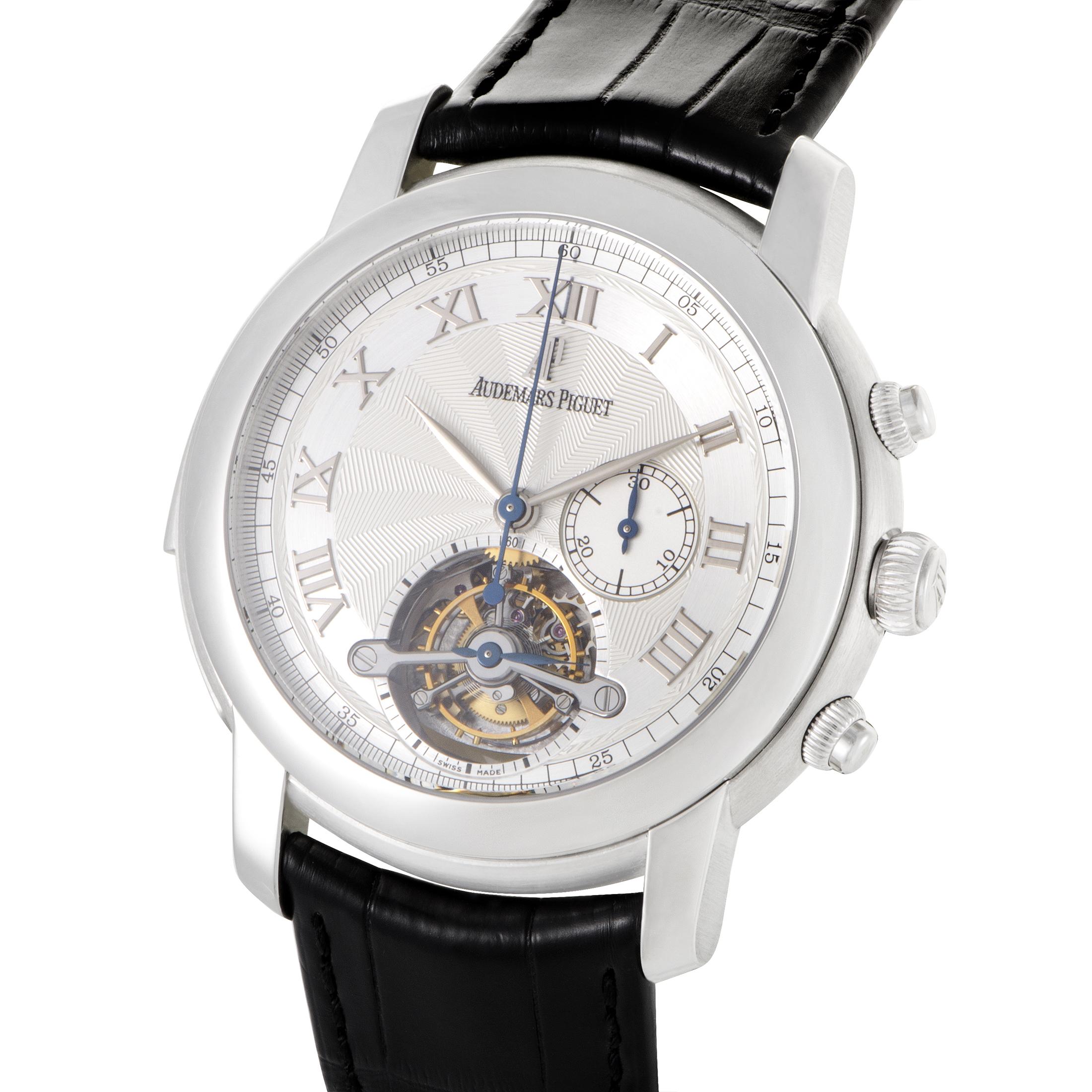The functions of this uniquely masculine Jules Audemars Minute Repeater Tourbillon watch from Audemars Piguet are hours, minutes, seconds, minute repeater, and tourbillon. These functions are cleverly set out on a stylish silver dial that is