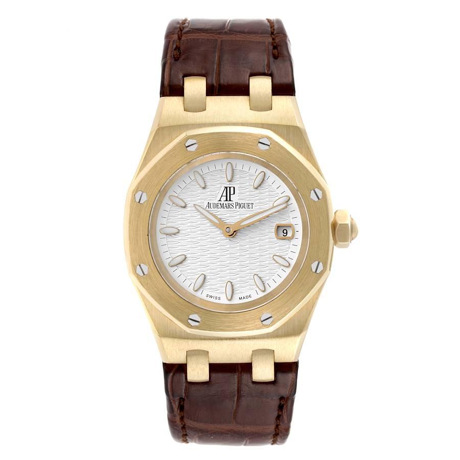 Audemars Piguet Lady Royal Oak 33mm Yellow Gold Ladies Watch 67600BA. Quartz movement. 18k yellow gold case 33.0 mm in diameter. 18k yellow gold bezel with 8 signature screws. Scratch resistant sapphire crystal. Silver decorated dial with raised