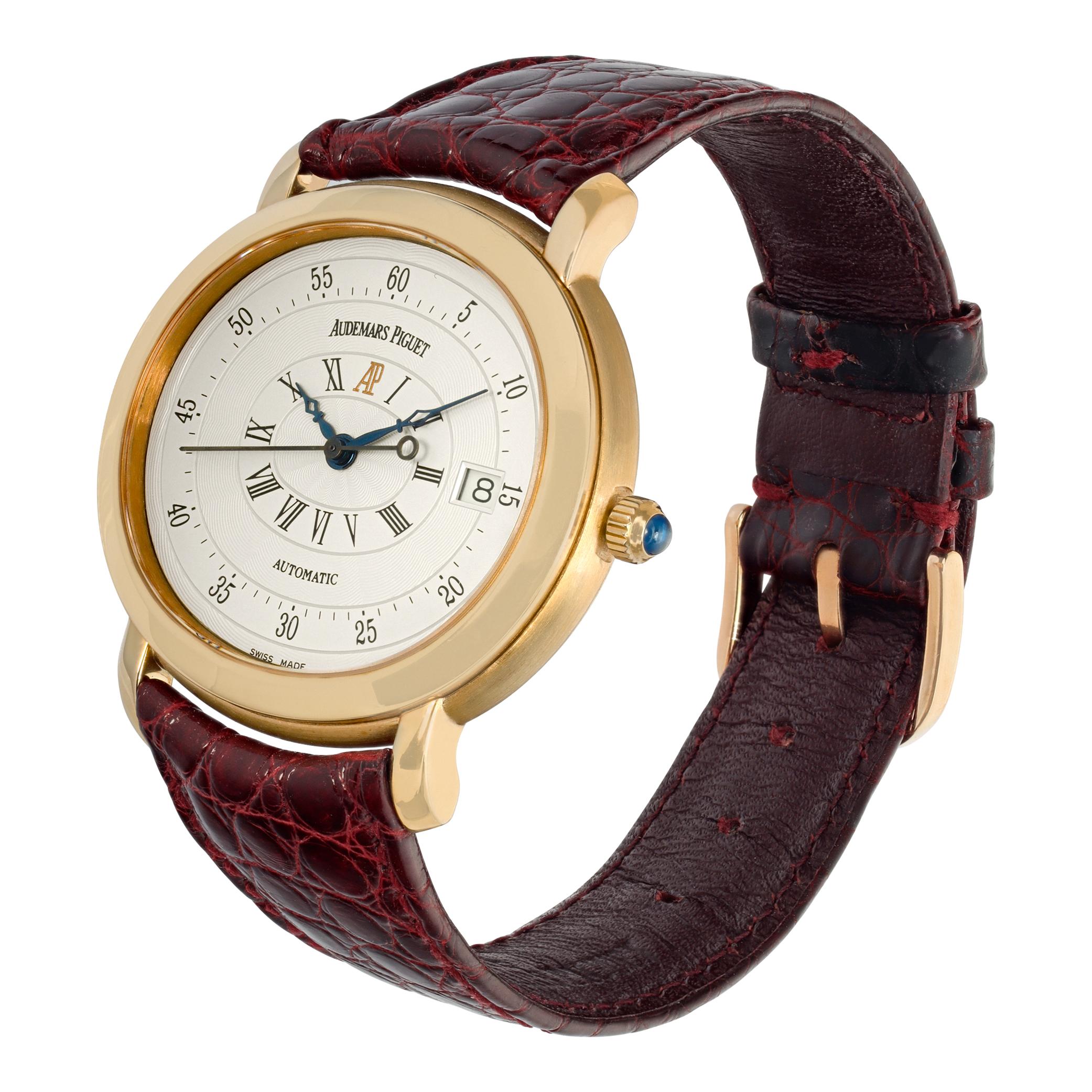Audemars Piguet Millenary in 18k yellow gold on a burgundy strap with an 18k yellow gold AP tang buckle. Auto w/ date and sweep seconds. 39 mm case size. With box and open papers. Ref 14908OR/O/0002. Fine Pre-owned Audemars Piguet Watch.

 Certified