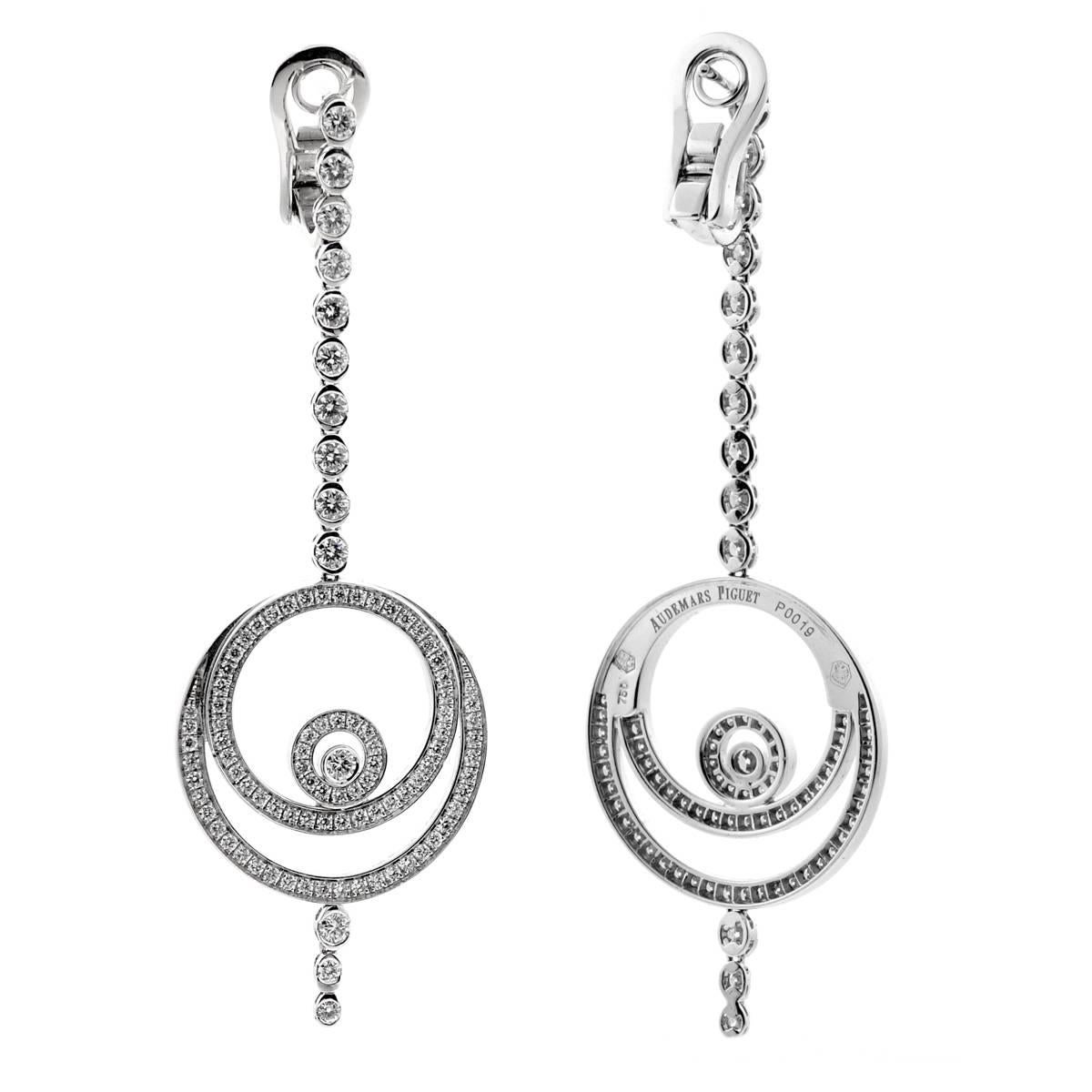 An pair of iconic Audemars Piguet diamond drop earrings featuring the timeless Millenary design in 18k white gold adorned with the finest round brilliant cut diamonds in 18k white gold.

Sku: 868
