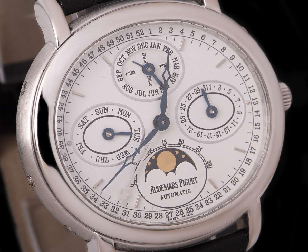 An 18k White Gold Millenary Quantieme Perpetual Calendar Gents Wristwatch, white dial with applied hour markers, date sub-dial at 3 0'clock, moonphase and power reserve indicator at 6 0'clock, weekday sub-dial at 9 0'clock, month sub-dial and leap