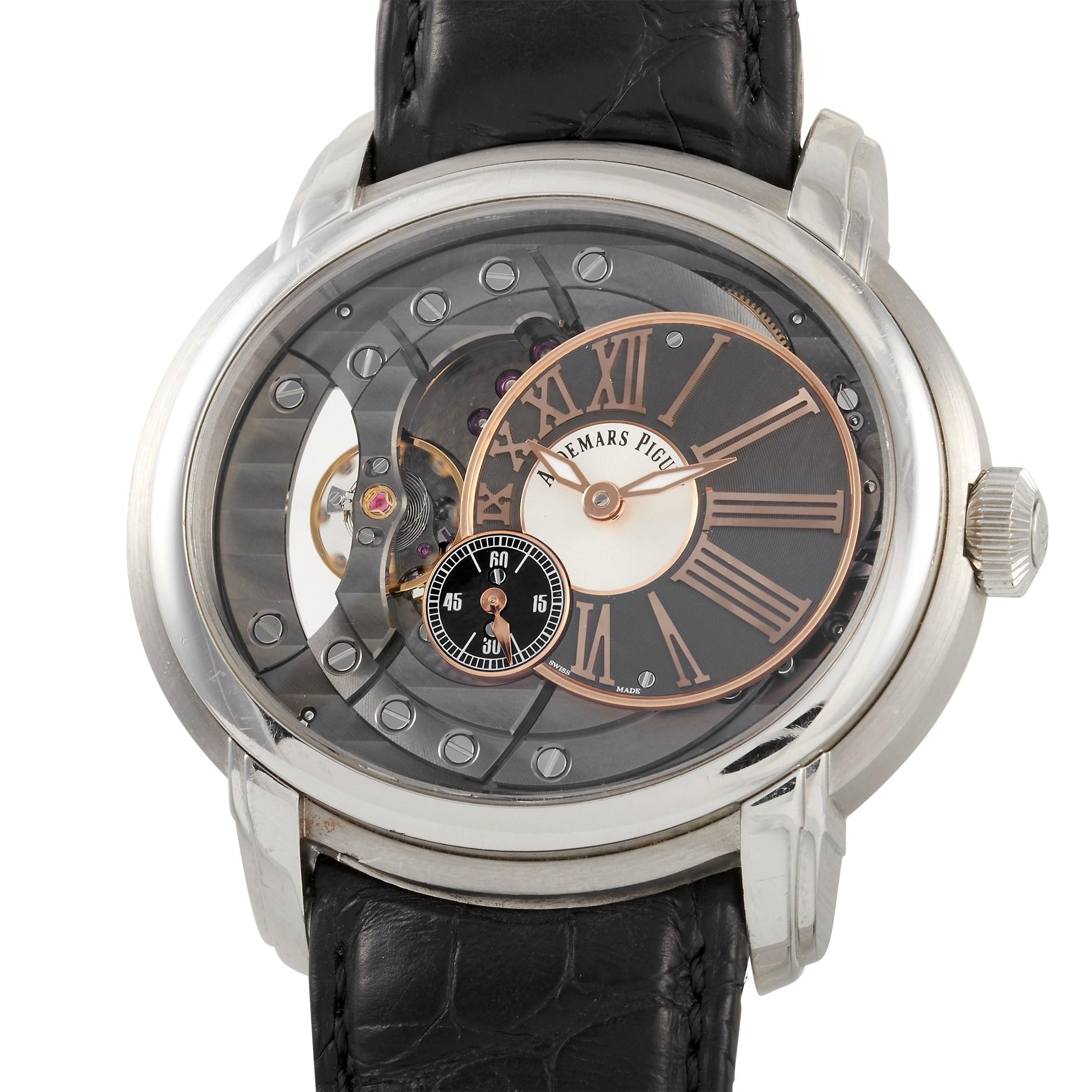 This classic Audemars Piguet Millenary Skeleton 47mm Stainless Steel Watch, reference number 15350ST.OO.D002CR.01, includes a stainless steel case measuring 47 mm in diameter. It is presented on a black leather strap with deployment clasp. The