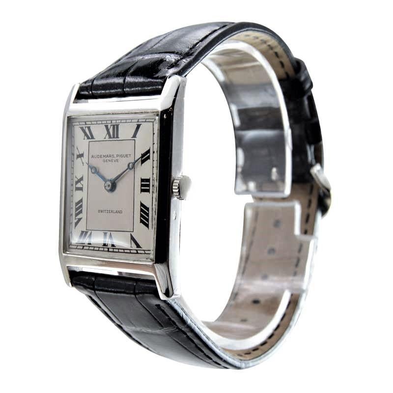 FACTORY / HOUSE: Audemars Piguet & Co.
STYLE / REFERENCE: Art Deco / Tank Style
METAL / MATERIAL: Platinum
CIRCA / YEAR: 1930's
DIMENSIONS / SIZE: Length 37mm X Diameter 26mm
MOVEMENT / CALIBER: Manual Winding / 18 Jewels 
DIAL / HANDS: Silvered