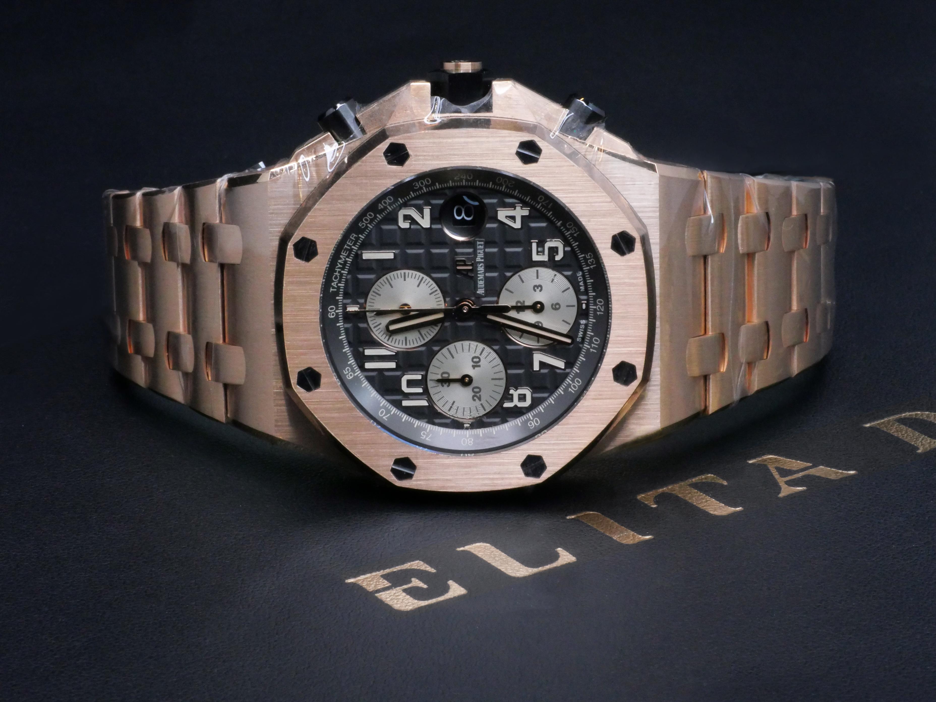 Audemars Piguet Royal Oak Offshore Chronograph 

Precious metals and a game of contrasts bring new character to the Royal Oak Offshore. Grey on pink: 18-carat pink gold case and bracelet harmonise with grey ruthenium-toned dial and inner bezel as
