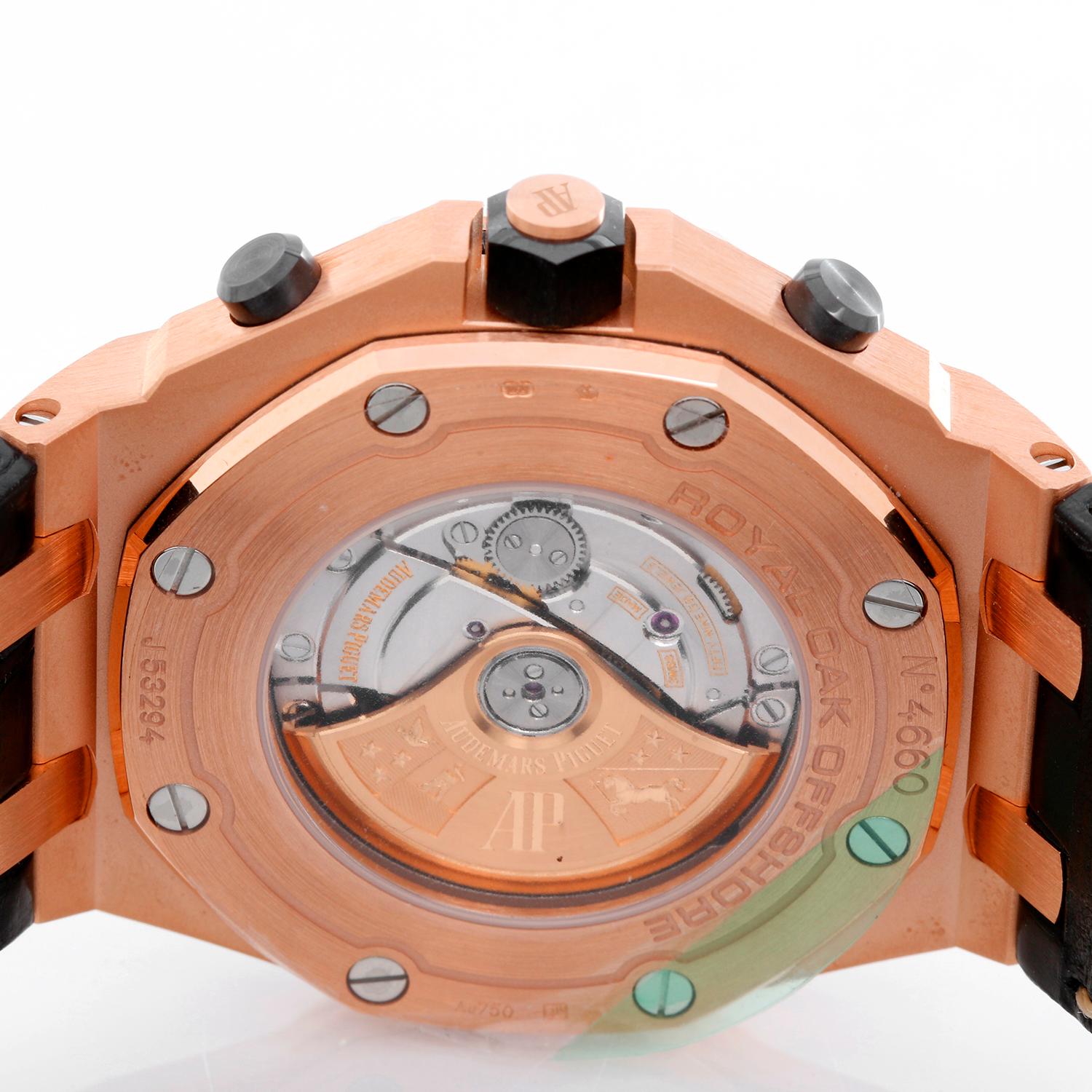 Audemars Piguet Royal Oak Offshore Chronograph 26470OR.OO.1.A002CR - Automatic. Rose gold case ( 42 mm ).  Audemars Piguet Rose gold waffle dial with black sub-dials and Roman numerals. Black strap band with rose gold Audemars deployant buckle.
