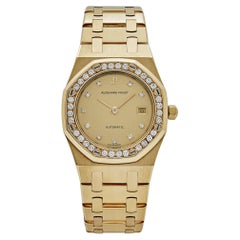 Audemars Piguet Royal Oak 14587/708BA Bisel de oro amarillo con champán y diamantes