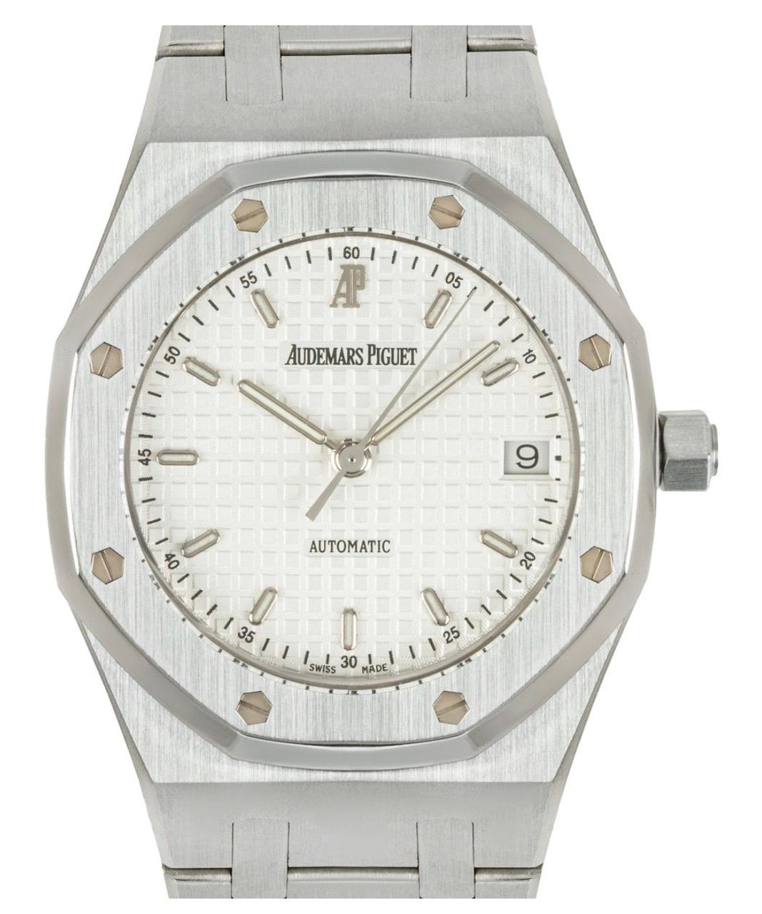 A 36mm stainless steel Royal Oak by Audemars Piguet. Featuring a white dial with a grande tapisserie pattern and a date aperture. The bezel further features the iconic 8-screw design synonymous with Audemars Piguet.

Equipped with a steel bracelet