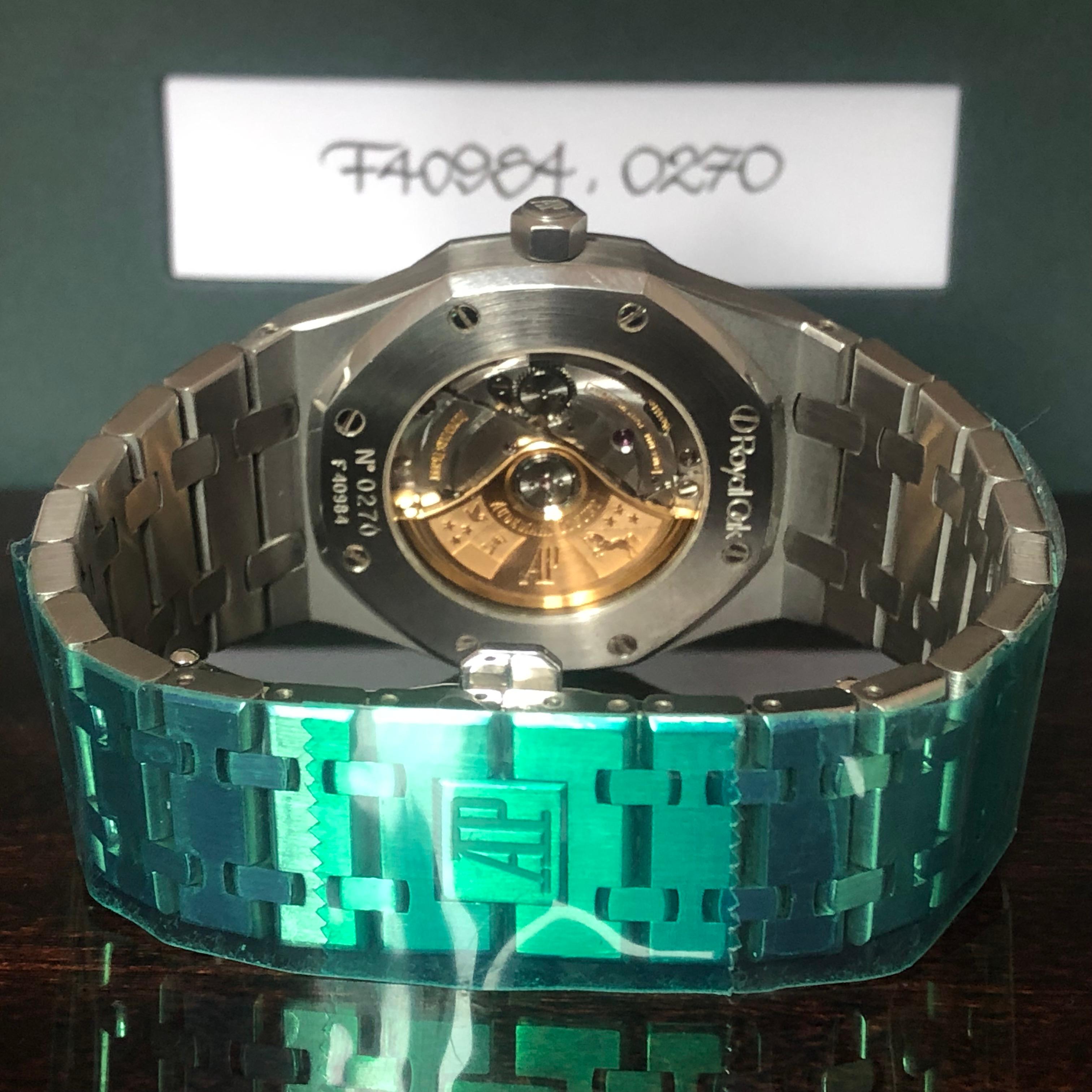 Remarkably well-preserved and attractive stainless steel wristwatch with an octagonal shape with an exhibition back secured by eight screws, eight screws to the bezel, movement 40 jewels, Gyromax balance adjusted to heat, cold, isochronism, arrived