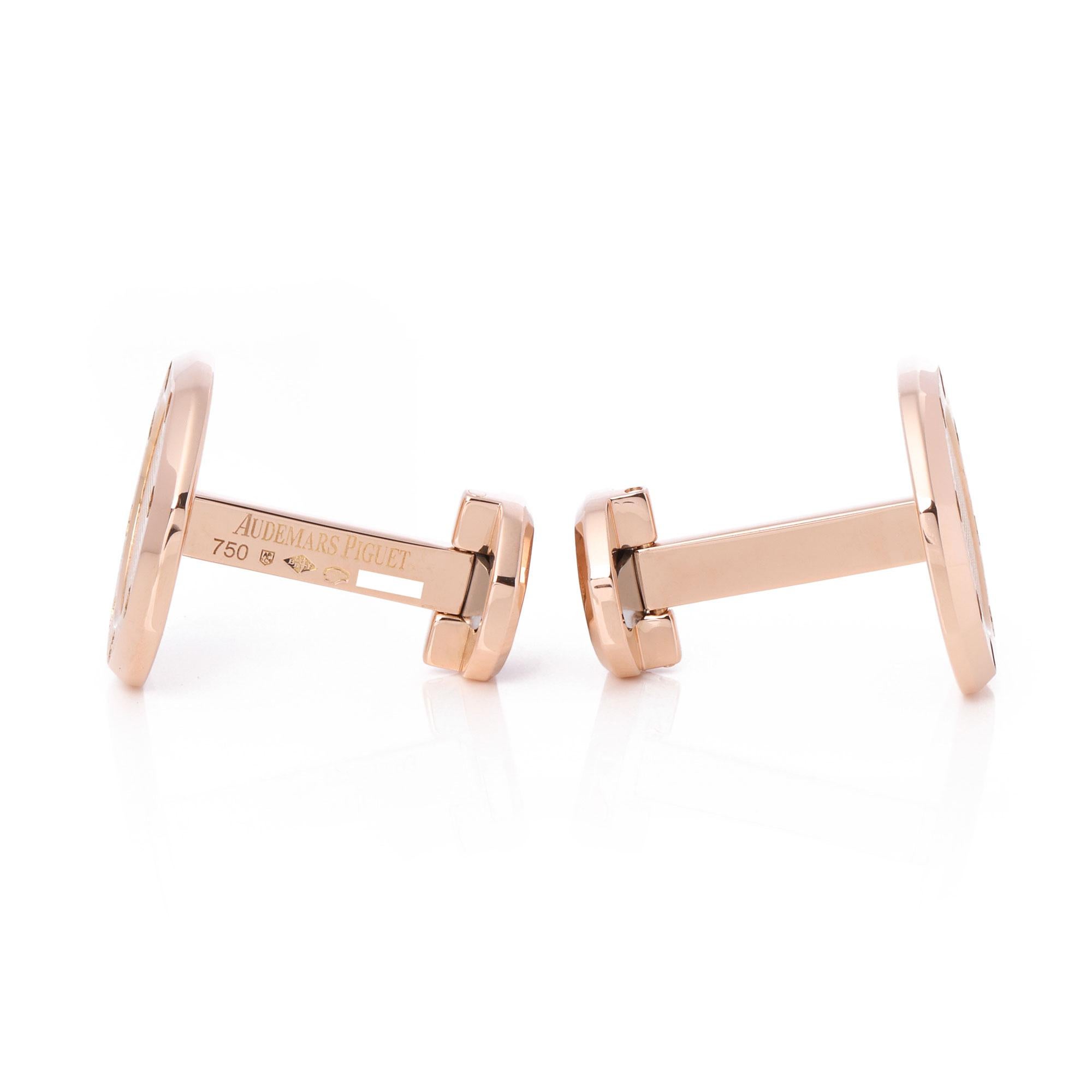 These cufflinks by Audemars Piguet are from their Royal Oak collection, they feature the signature octagonal shape with hexagonal screws and AP's famous 'Tapisserie' dial design in the centre made in 18ct pink gold. Accompanied with a Xupes