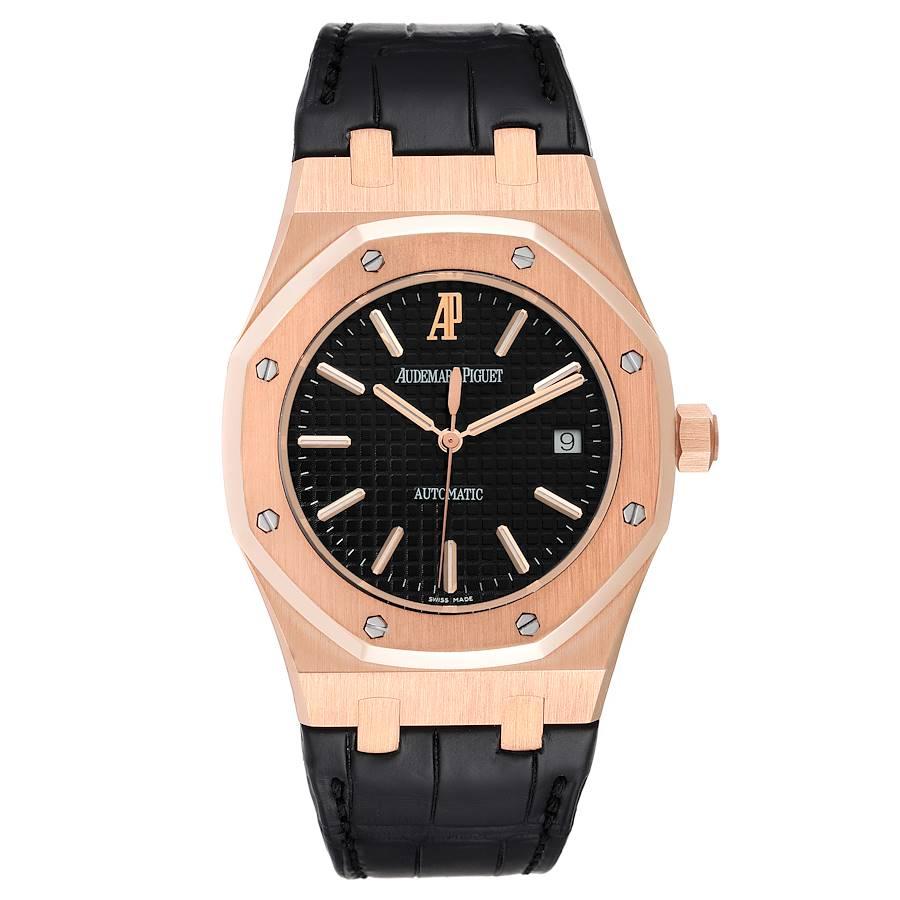 Audemars Piguet Royal Oak 18k Rose Gold Black Dial Watch 15300OR Box Papers. Automatic self-winding movement. 18k rose gold case 39.0 mm in diameter. Exhibition saphire crystal case back. 18k rose gold bezel punctuated with 8 signature screws.