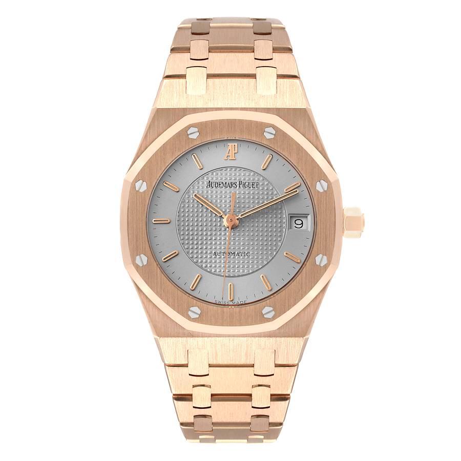 Audemars Piguet Royal Oak 18k Rose Gold Nick Faldo LE Mens Watch 15097OR. Automatic self-winding movement. 18k rose gold case 37.0 mm in diameter. 18k rose gold bezel punctuated with 8 signature screws. Scratch resistant sapphire crystal. Silver