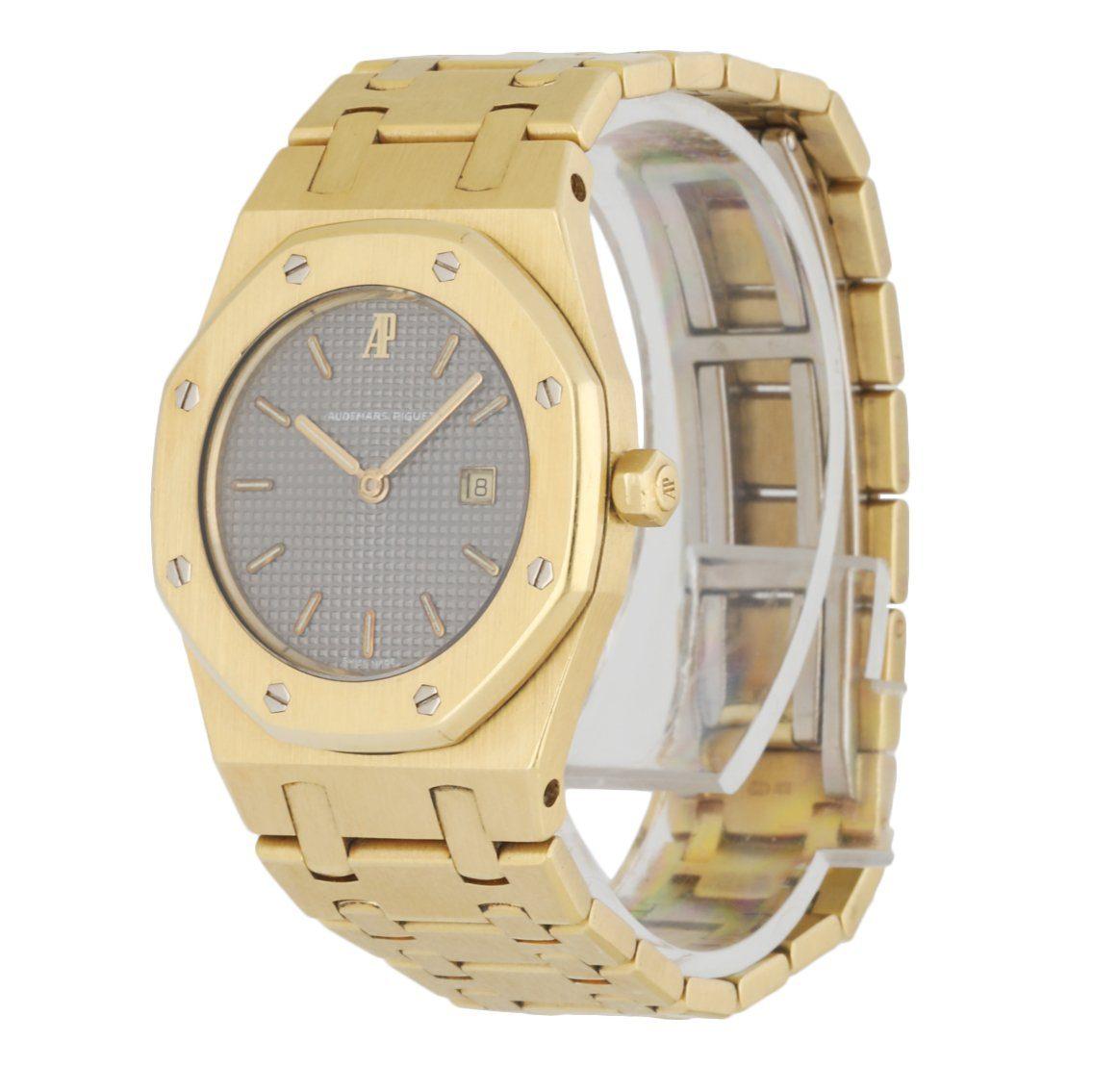 Audemars Piguet Ladies watch. 30MMÂ 18K yellow gold case withÂ OctagonÂ bezel.Â Gray dial with gold tone luminous hands and index hour marker. Date display at 3 o'clock position.Â 18K yellow goldÂ AP bracelet withÂ 18K white gold fold over clasp