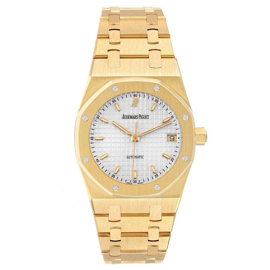 Audemars Piguet Royal Oak 18k Yellow Gold Mens Watch 14790BA. Automatic self-winding movement. 18k yellow gold case 36.0 mm in diameter. 18k yellow gold bezel punctuated with 8 signature screws. Scratch resistant sapphire crystal. Silver Tapisserie