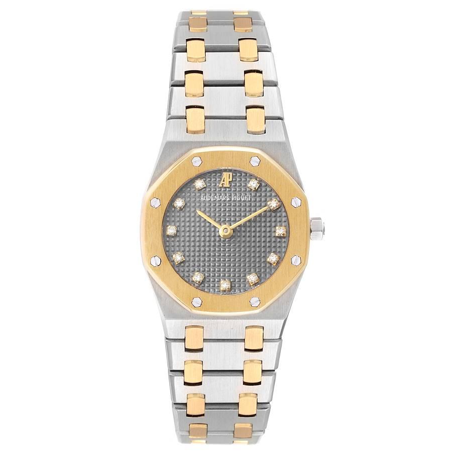 Audemars Piguet Royal Oak 24mm Steel Yellow Gold Diamond Ladies Watch. Quartz movement. Brushed stainless steel and 18K yellow gold case 24.0 mm in diameter. 18K yellow gold bezel punctuated with 8 signature screws. Scratch resistant sapphire