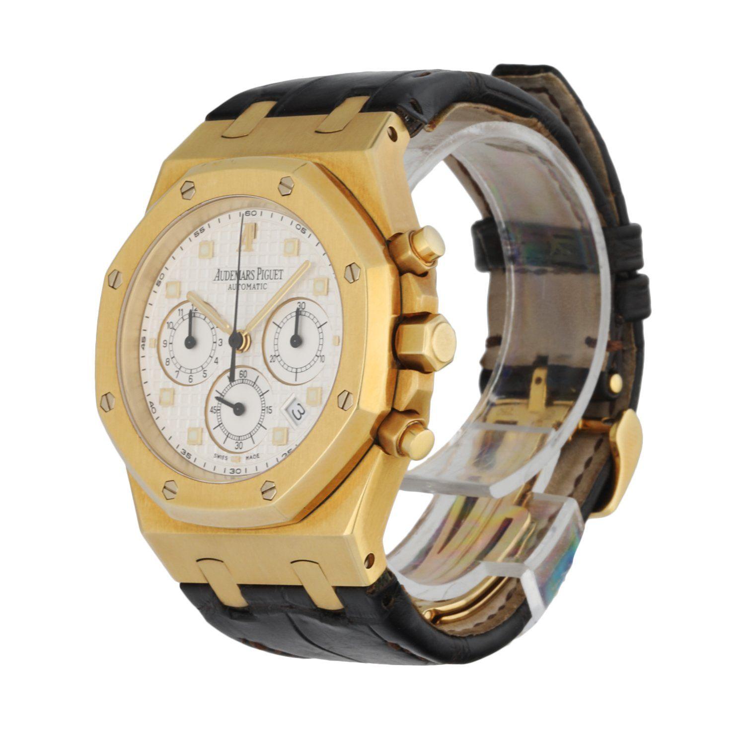 Audemars Piguet Royal Oak 26022BA men's watch.39mmÂ yellow gold case and octagonal shaped bezel.Â WhiteÂ dial with an engraved tapestry 