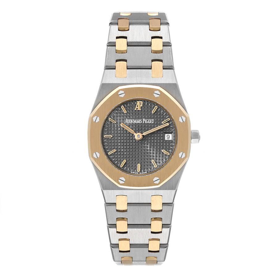 Audemars Piguet Royal Oak 26mm Steel Yellow Gold Ladies Watch. Quartz movement. Brushed stainless steel and 18K yellow gold case 26.0 mm in diameter. 18K yellow gold bezel punctuated with 8 signature screws. Scratch resistant sapphire crystal. Grey