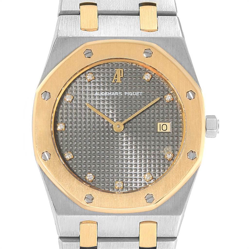 Audemars Piguet Royal Oak 33mm Grey Dial Steel Yellow Gold Mens Watch. Quartz movement. Brushed stainless steel and 18K yellow gold case 33.0 mm in diameter. 18K yellow gold bezel punctuated with 8 signature screws. Scratch resistant sapphire