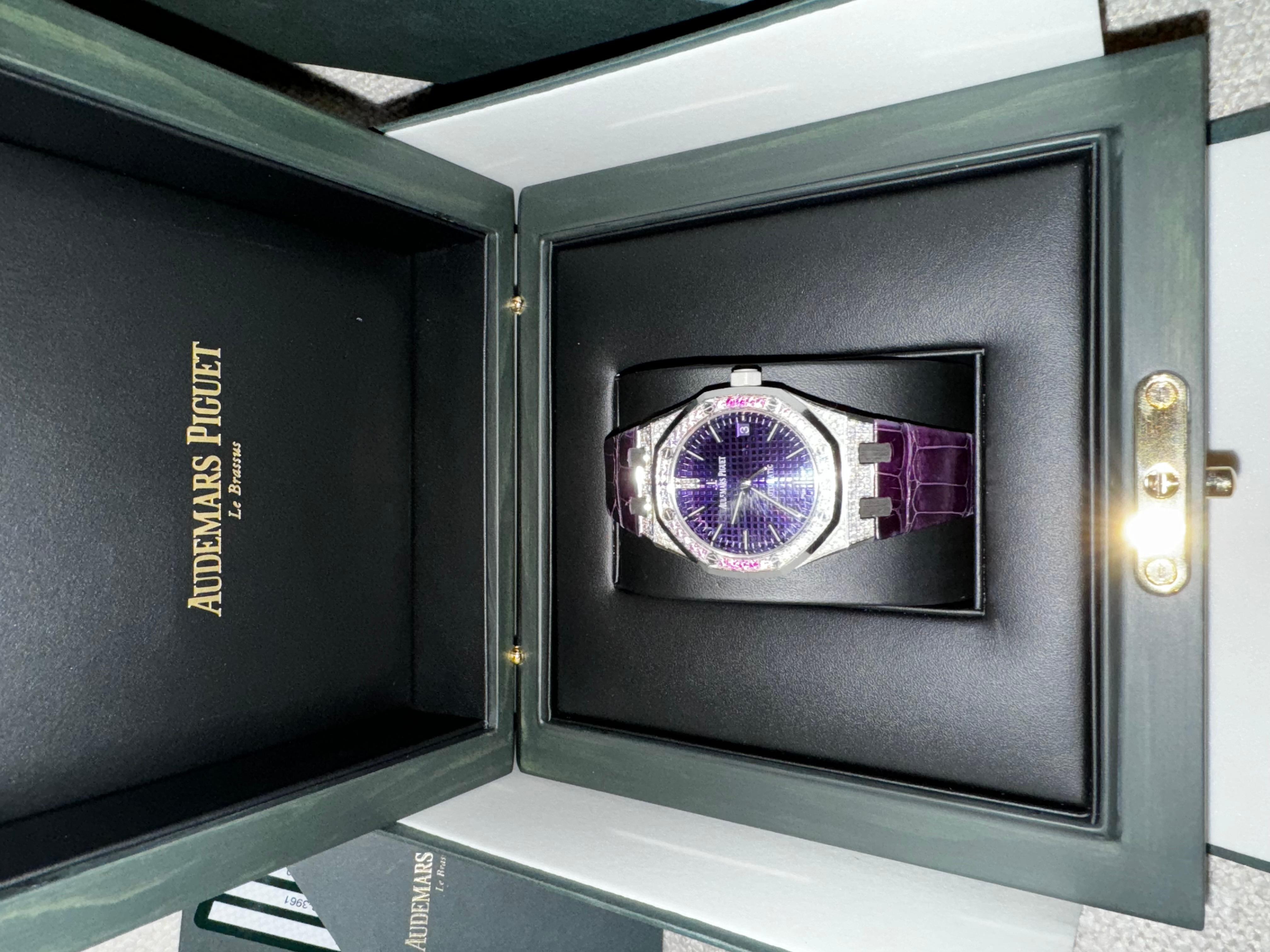 Audemars Piguet Royal Oak 37m Purple Dial  Limited Edition 100 pieces worldwide. Very exclusive beauty. Comes with or original box and card. 
Brilliant-cut sapphires in graded hues of pink and blue adorn the white gold bezel and illuminate the