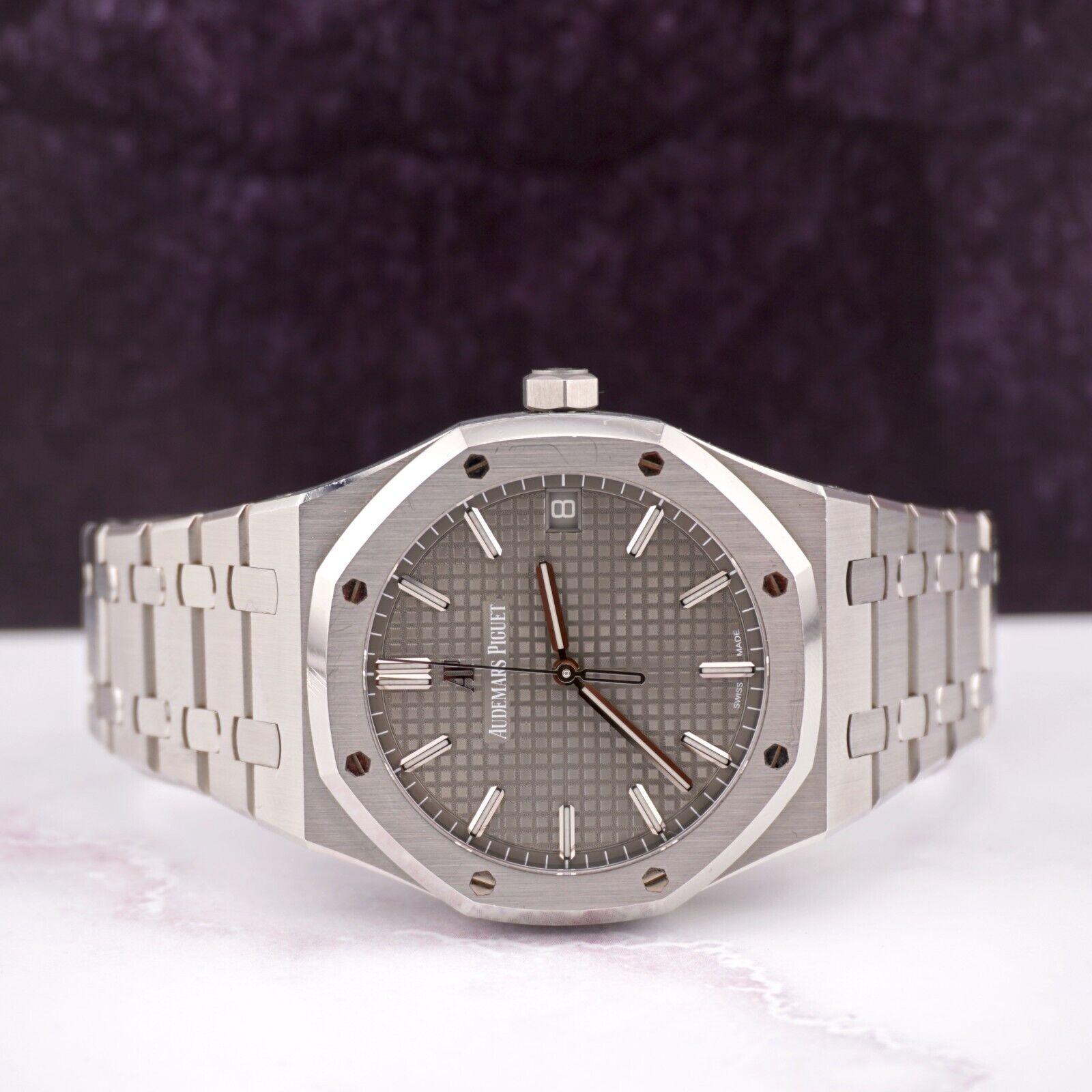 Audemars Piguet Royal Oak 41mm Watch

Pre-owned w/ Original Box & Card
100% Authentic Authenticity Card
Condition - (Excellent Condition) - See Pics
Watch Reference - 15500ST
Model - Royal Oak
Dial Color - Gray
Material - Stainless Steel
Watch Will