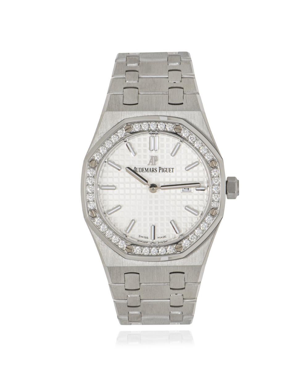 A stunning 33mm ladies Royal Oak wristwatch crafted in stainless steel by Audemars Piguet. Features a silver-toned dial with grande tapisserie pattern, a date display and a stainless fixed bezel set with 40 brilliant cut diamonds weighing at