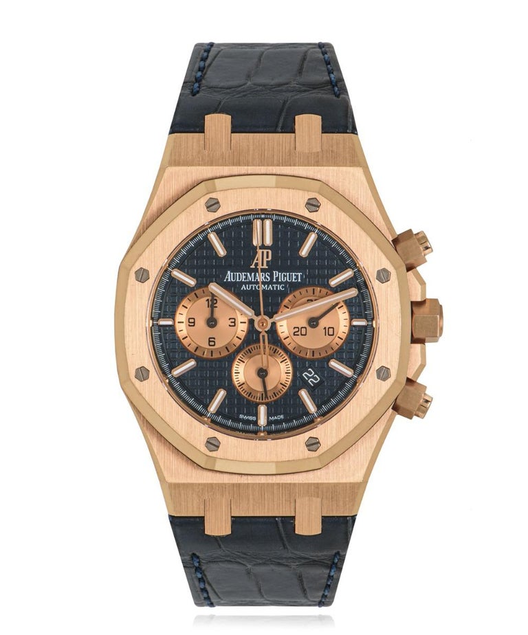 A 41mm Royal Oak Chronograph in 18k rose gold by Audemars Piguet. Featuring a distinctive blue grande tapisserie dial with bigger rose gold chronograph counters that Audemars Piguet has changed up in this design and features a 60 second, 30 minute