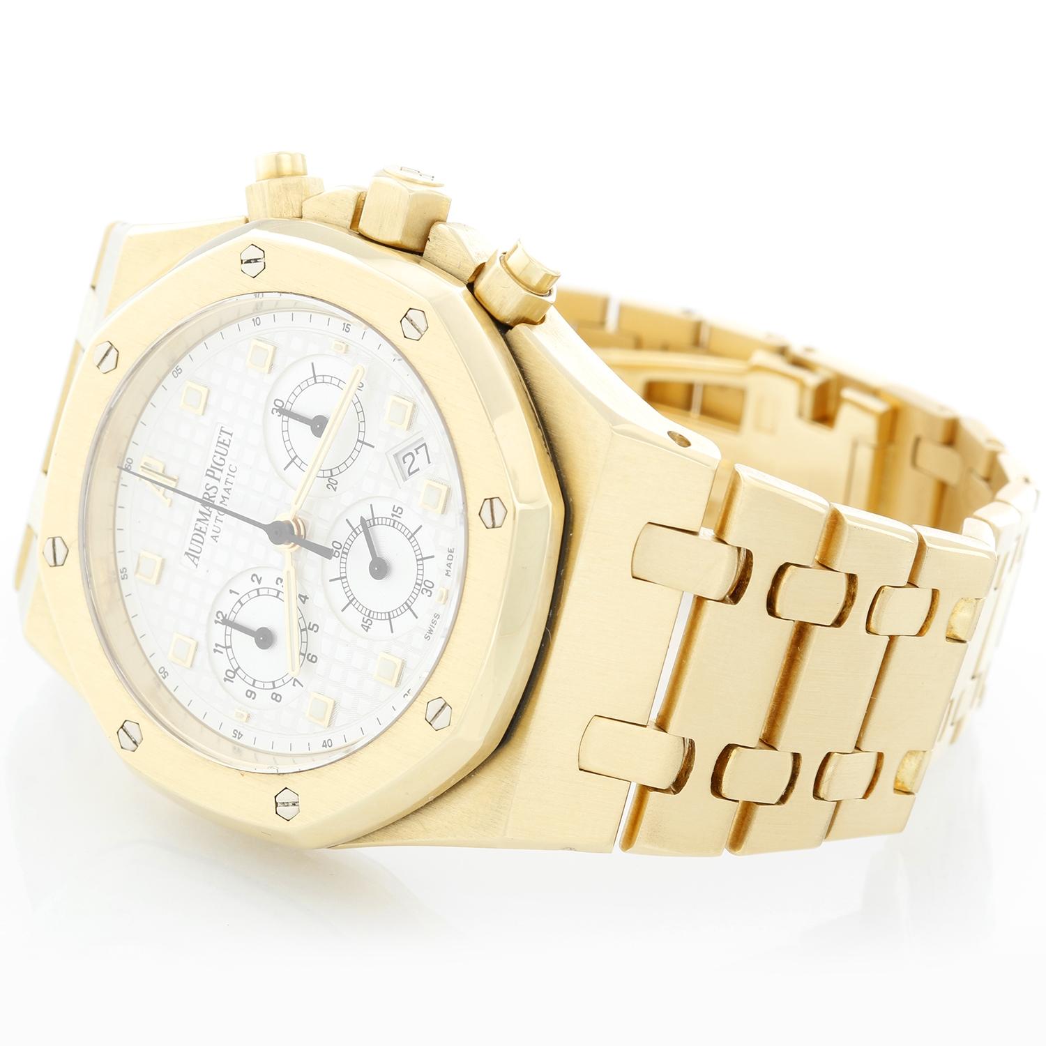 Audemars Piguet Royal Oak Chronograph Men's 18k Yellow Gold Watch 25960BA/O/1185BA/01 - Automatic winding chronograph with date. 18k yellow gold case (39mm diameter). Ivory colored waffle textured dial; gold and luminous style hour markers; date