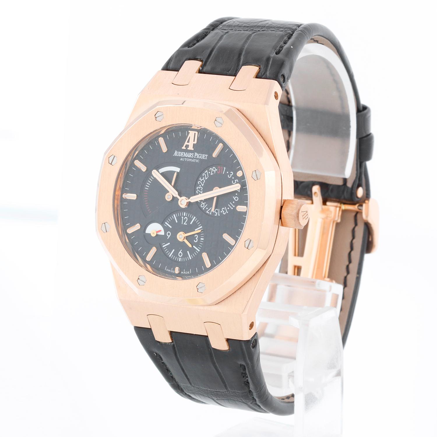 Audemars Piguet Royal Oak Dual Time Rose Gold Mens Watch 26120OR.00.D002CR.01 - Automatic winding. 18k Rose Gold ( 39 mm ) Solid case back. Black dial with Grande Tapisserie waffle pattern, luminous baton hour markers and hands. Dual/second time