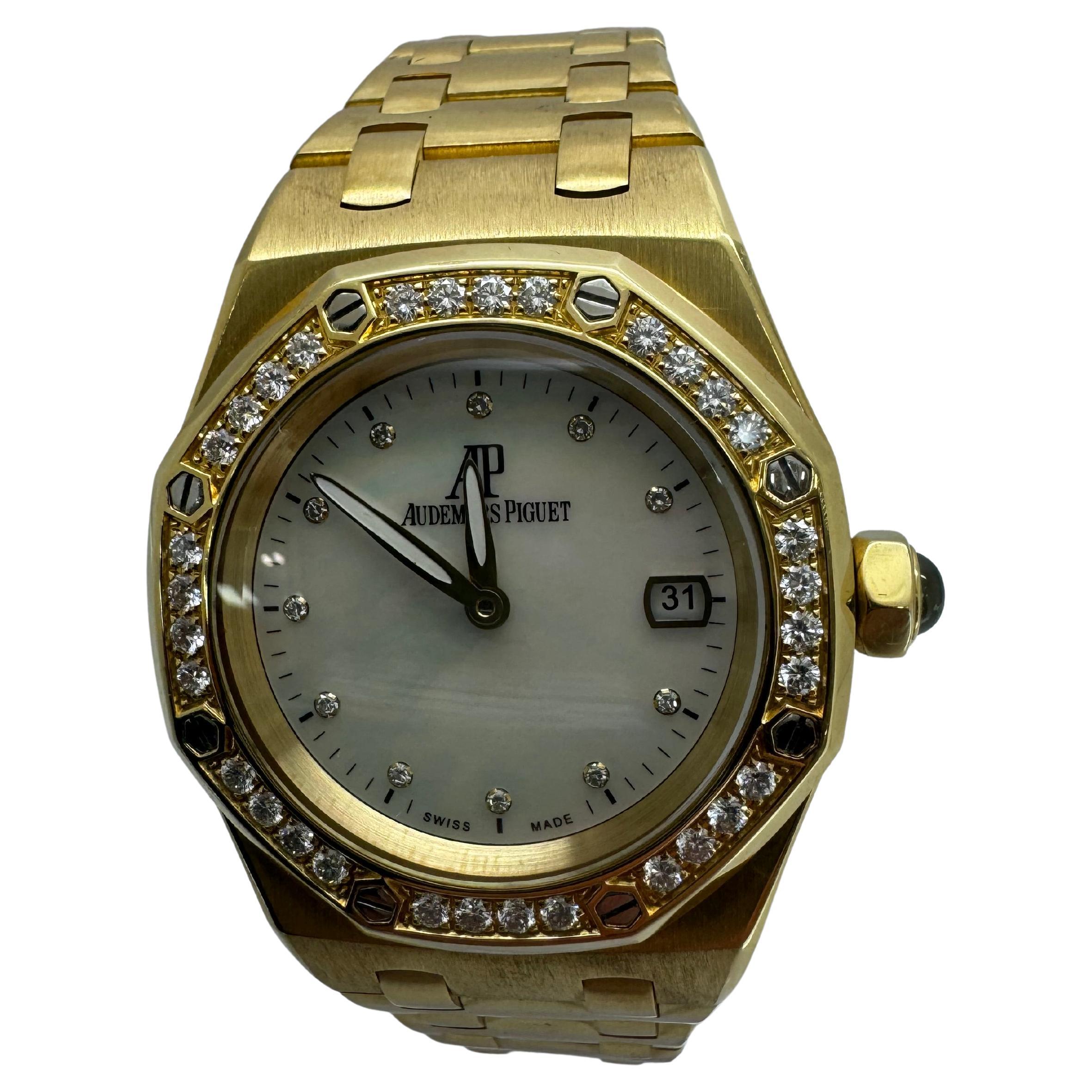 Reloj Audemars Piguet Royal Oak femenino de 33 mm 67601BA Esfera MOP de oro amarillo con diamantes
