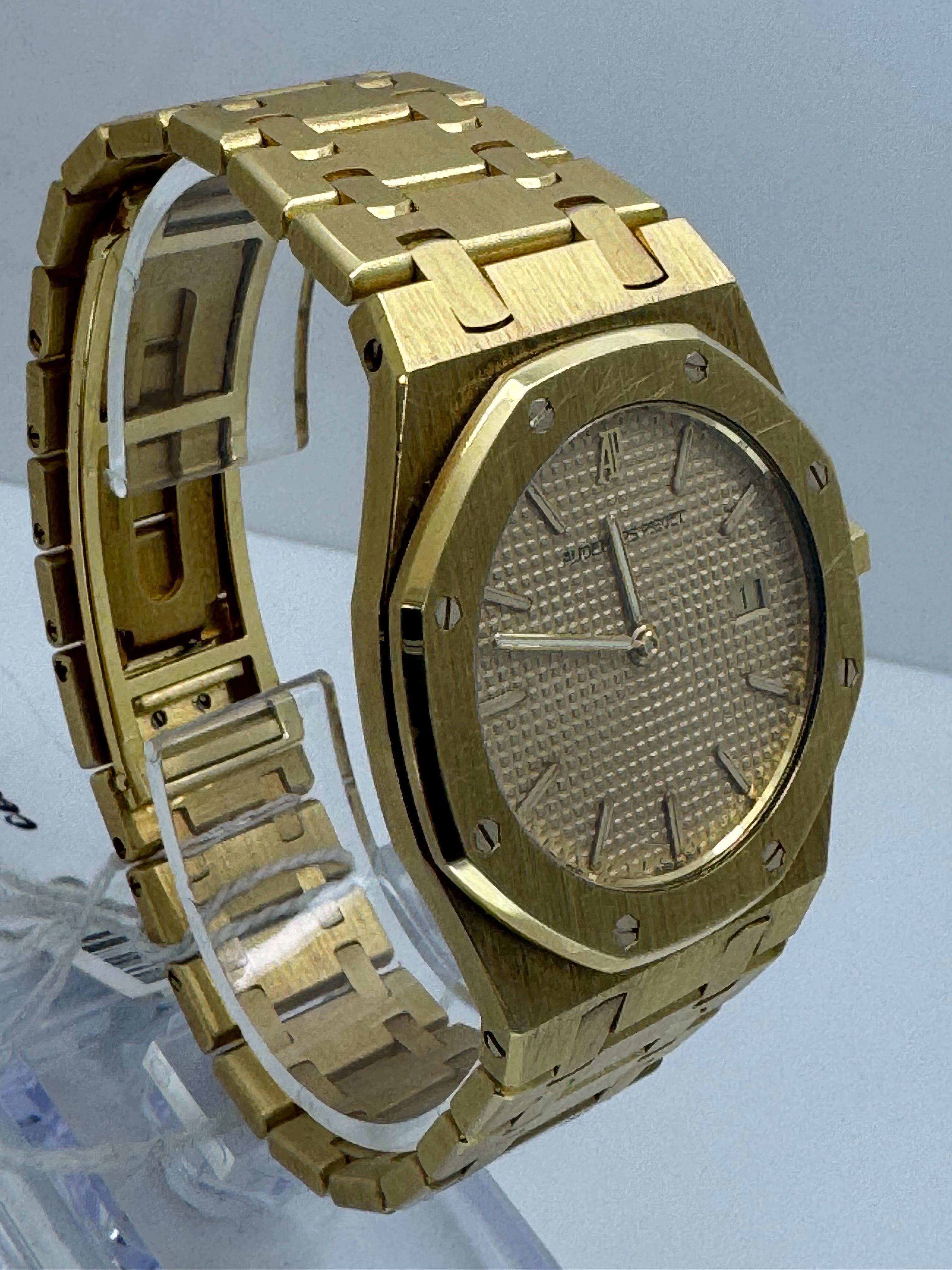 Audemars Piguet Royal Oak Ladies 33mm Yellow Gold Watch – Ref. 56303BA

Elevate your collection with this iconic Audemars Piguet Royal Oak Ladies watch, reference 56303BA, crafted entirely in 18k yellow gold. Known for its distinctive octagonal