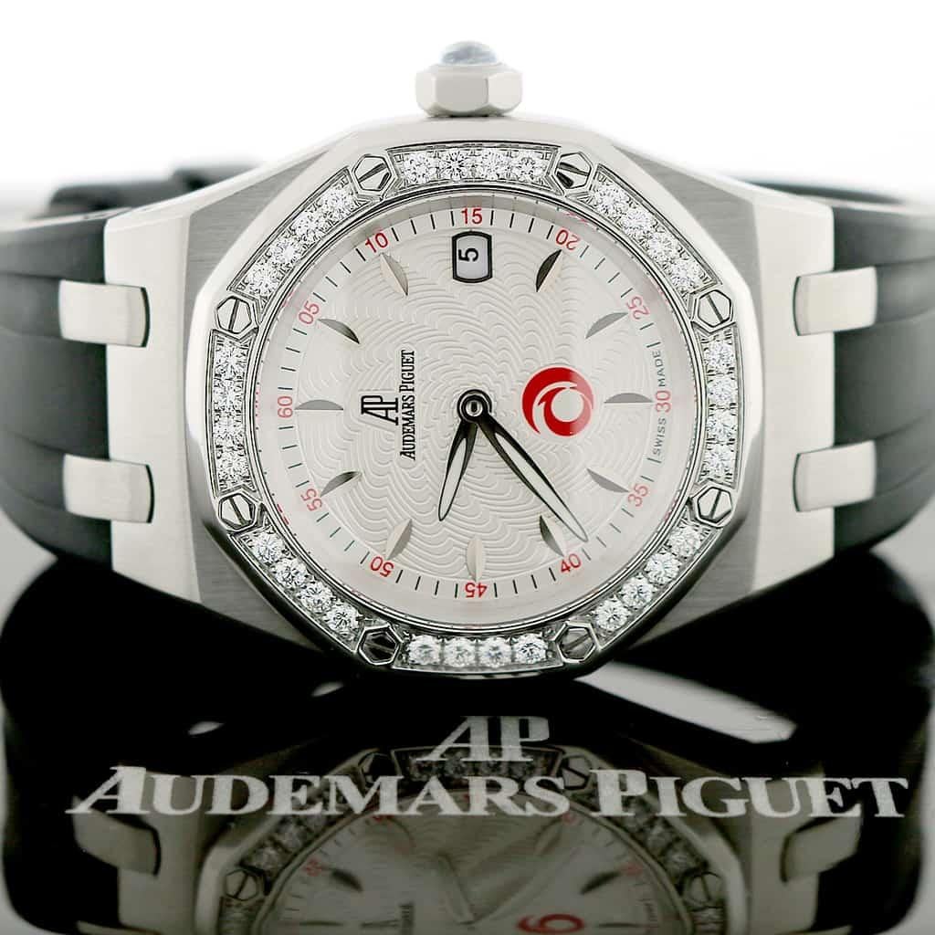 Audemars Piguet Royal Oak Lady Alinghi Limited Edition Watch, 67611ST.ZZ.D012CR.01. Quartz battery movement. Stainless steel case 33mm in diameter.  Push-down crown. Original Audemars Piguet stainless steel bezel factory set with 32 diamonds.
