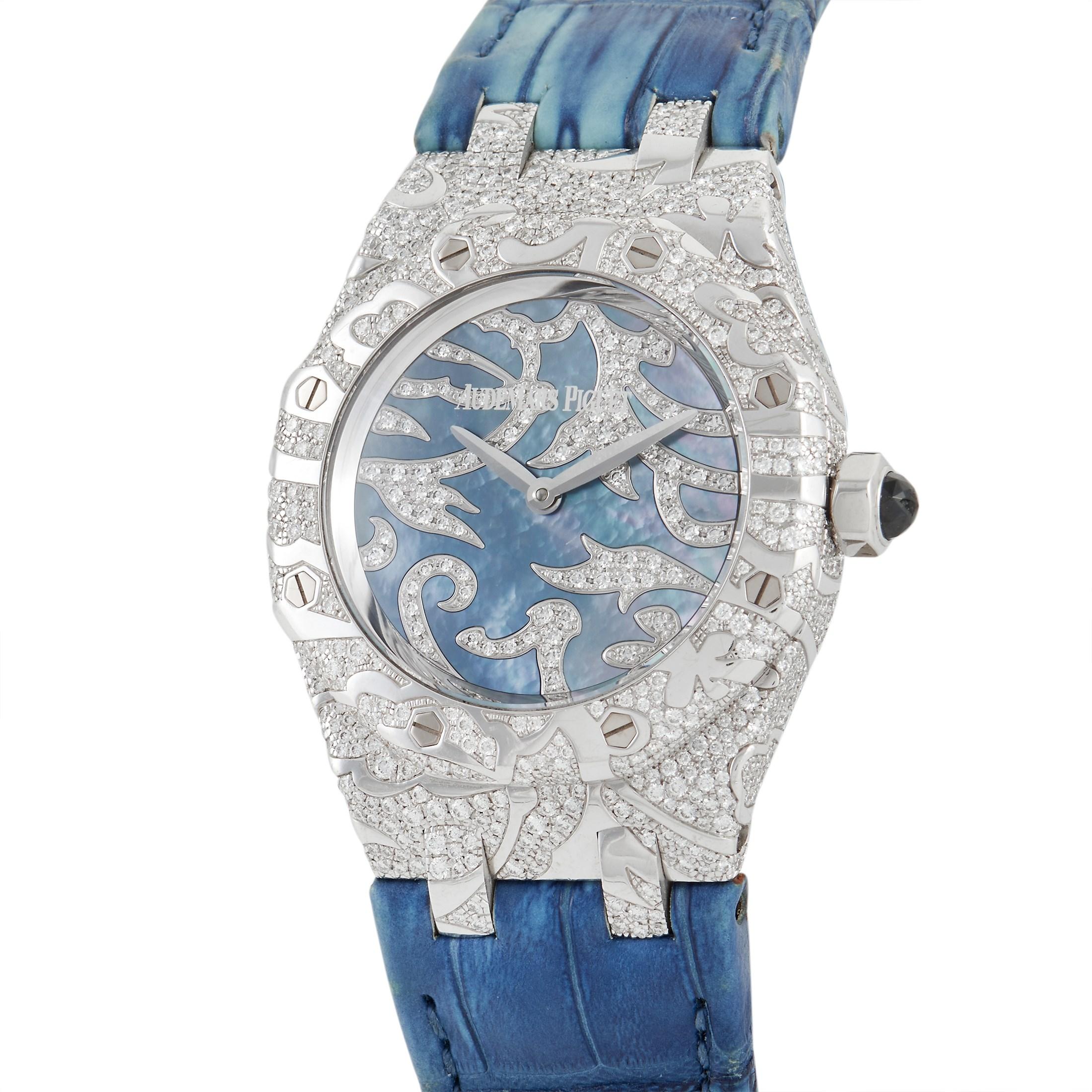 The Audemars Piguet Royal Oak Leaves Ladies Watch, reference number 67607BC.ZZ.D001SU.01, is a chic, sophisticated timepiece with plenty of personality. 

This watch features a 33mm case and bezel featuring glittering diamonds in a stylish 18K White