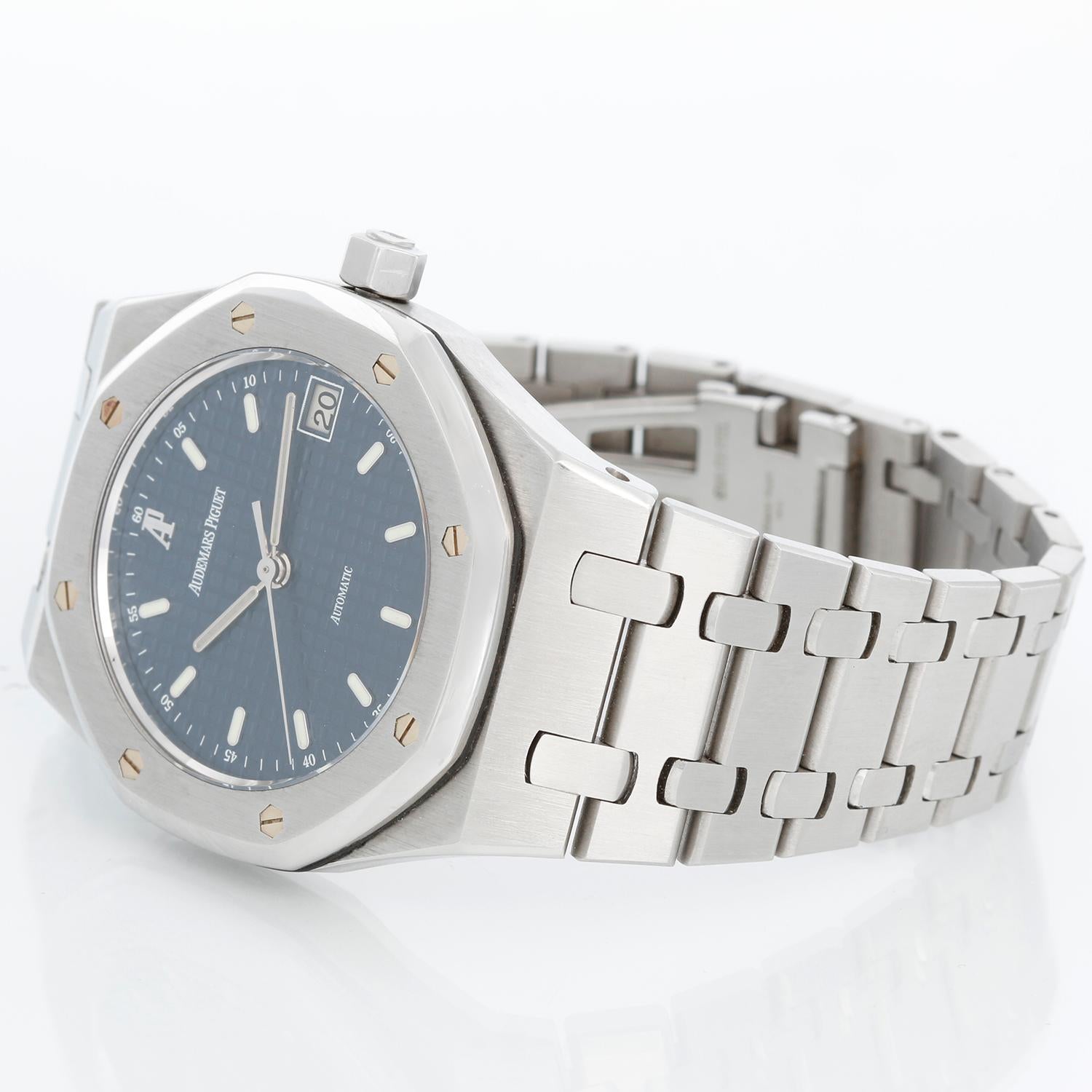 Audemars Piguet Royal Oak Men's Automatic Watch Stainless Steel 14790ST - Automatic winding with date. Stainless steel case (36mm diameter). Blue waffle dial with stick markers. Stainless steel Royal Oak bracelet. Pre-owned with Audemars Piget box.