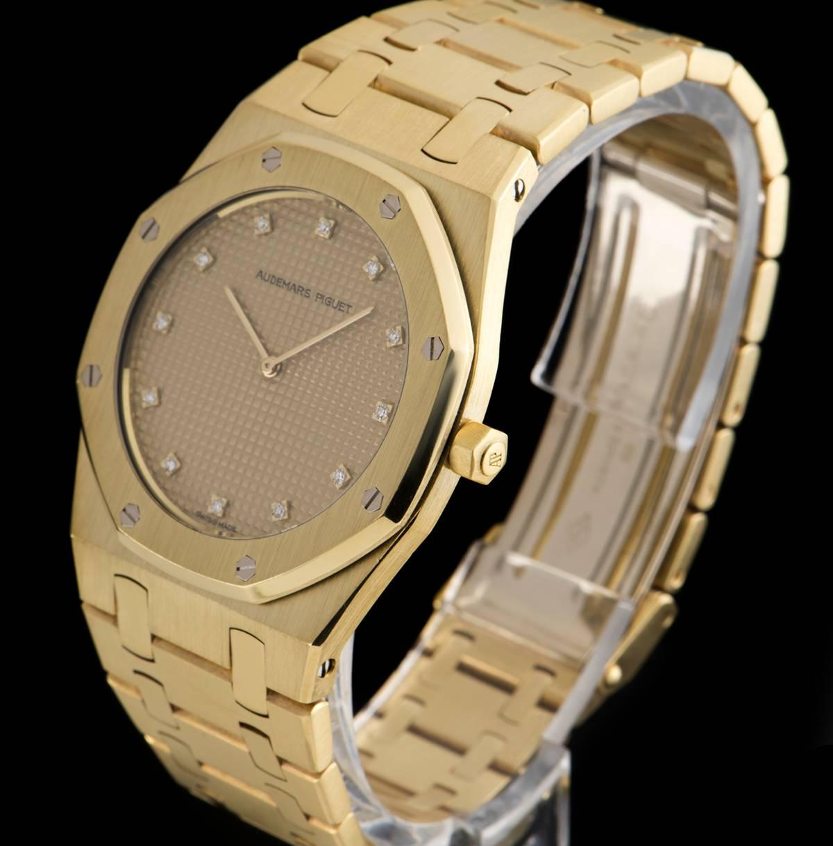 An 18k Yellow Gold Royal Oak Unisex Wristwatch, champagne waffle dial with 10 applied round brilliant cut diamond hour markers, a fixed 18k yellow gold bezel with 8 iconic Audemars Piguet screws, an 18k yellow gold bracelet with an 18k yellow gold