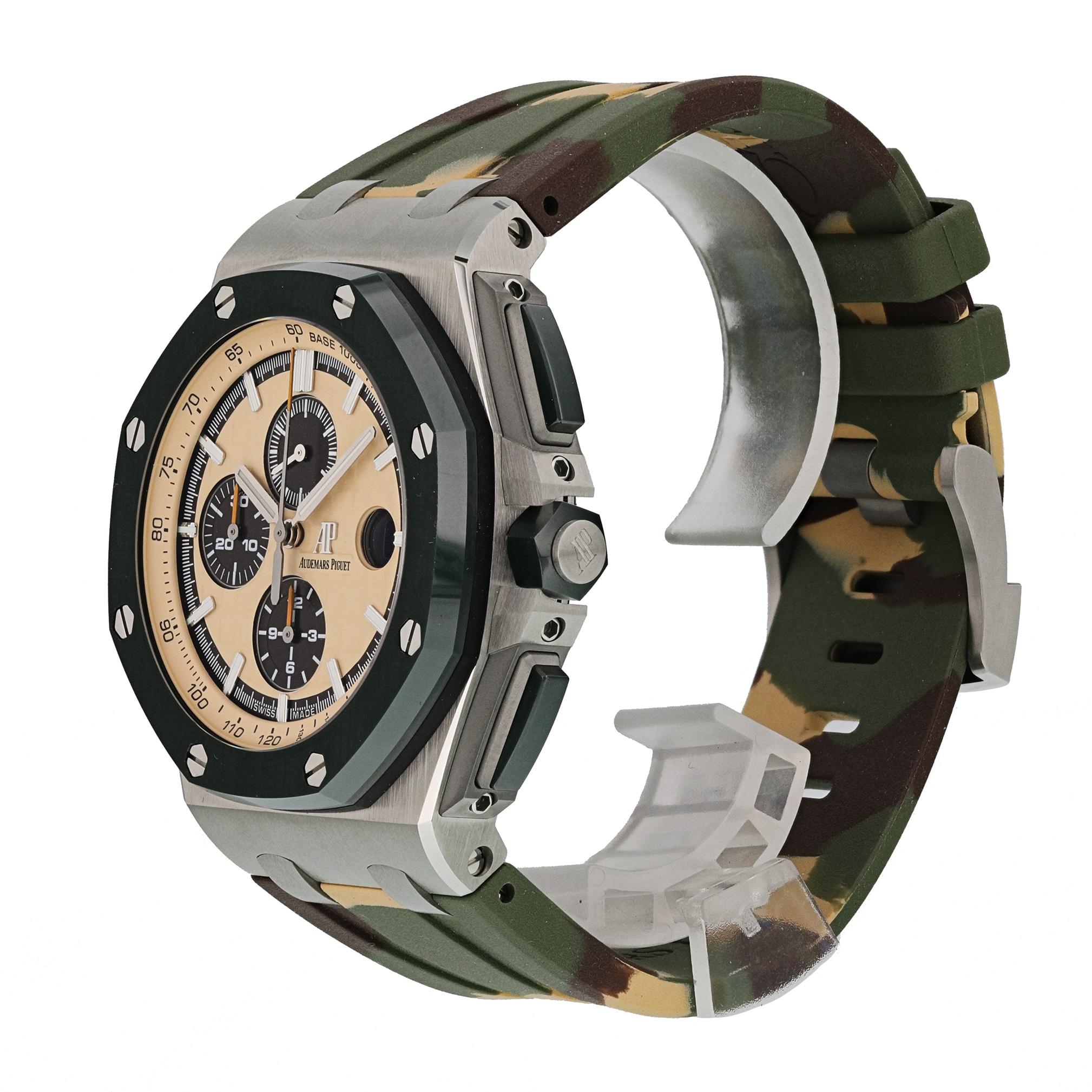 Audemars Piguet Royal Oak Offshore  26400SO.OO.A054CA.01 Mens Watch. 
38mm Platinum case. 
Ceramic green bezel. 
Beige dial with Luminous Steel hands and index hour markers. 
Minute markers on the outer dial. 
Date display at the 3 o'clock position.