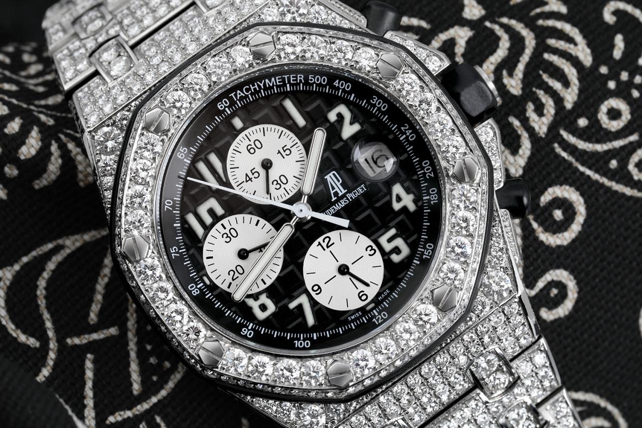 Audemars Piguet Royal Oak Offshore Chronograph 42mm Stainless Steel Diamond Watch with Black Dial 25721ST

Black dial with “Petite Tapisserie” pattern, white counters, white gold applied hour-markers and Royal Oak hands with luminescent coating,