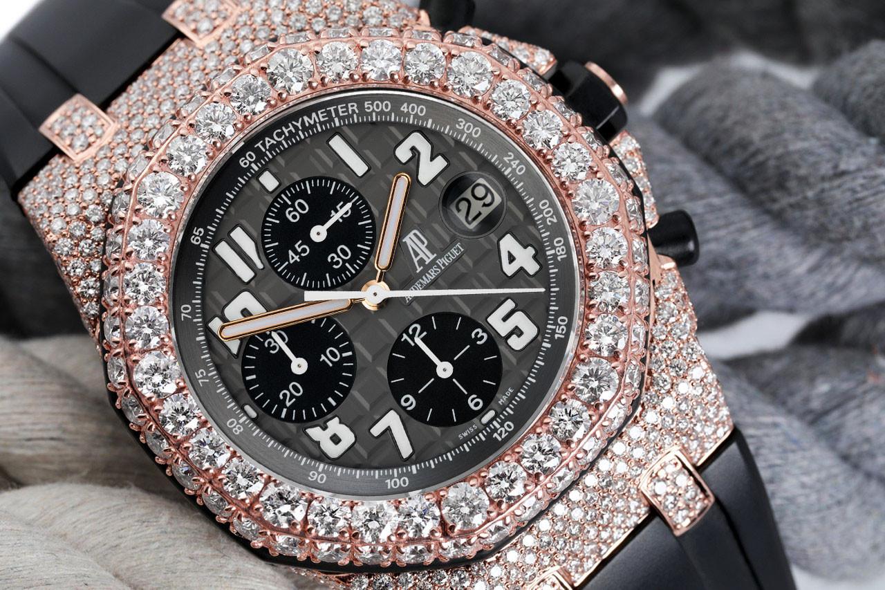 Audemars Piguet Royal Oak Offshore Chronograph Fully Diamond Rose Gold Watch Grey Dial Rubber Band 25940OK

This watch comes with a LIFETIME diamond replacement warranty. We are so confident in our diamonds setters that if any of the individual