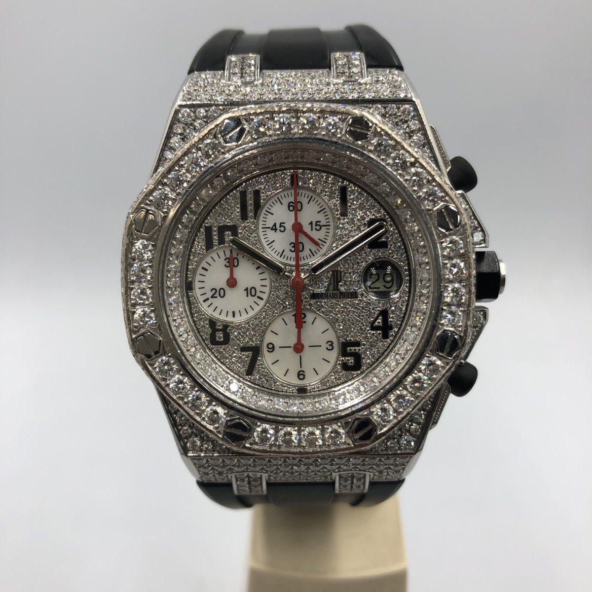 Audemars Piguet Royal Oak Offshore 26170ST.OO.1000ST.09 with a Custom diamond dial watch in 42mm 

Set with diamonds, stainless steel case with Custom Diamond Pave with White Subdials with Arabic numerals, on black rubber strap. 

With original box