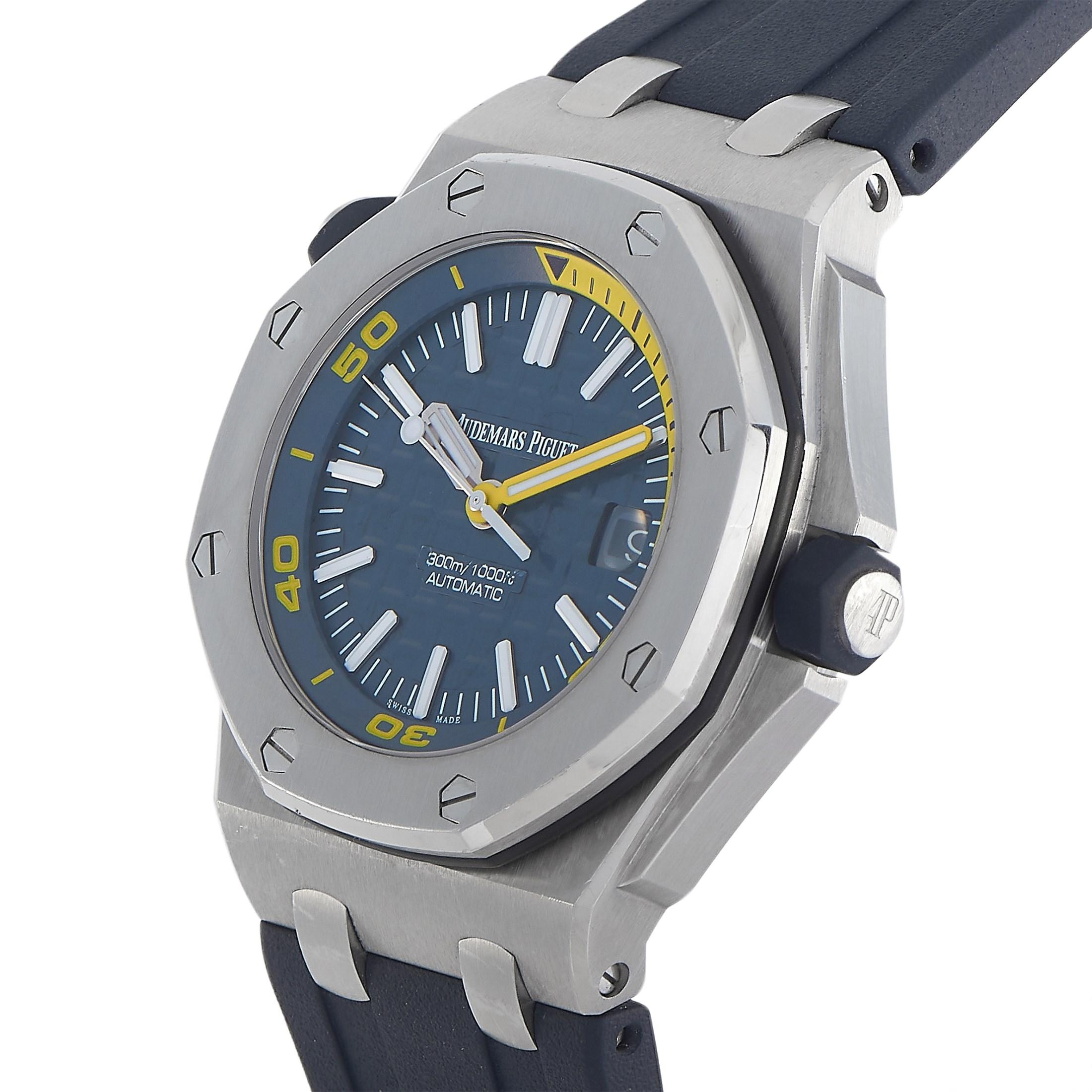 The Audemars Piguet Royal Oak offshore Diver Watch 15710ST.OO.A027CA.01 features a bold visual style. It has a 42mm stainless steel case that is 14.1 mm thick, blue screw-locked crowns clad in rubber, and a rubber strap with stainless steel pin