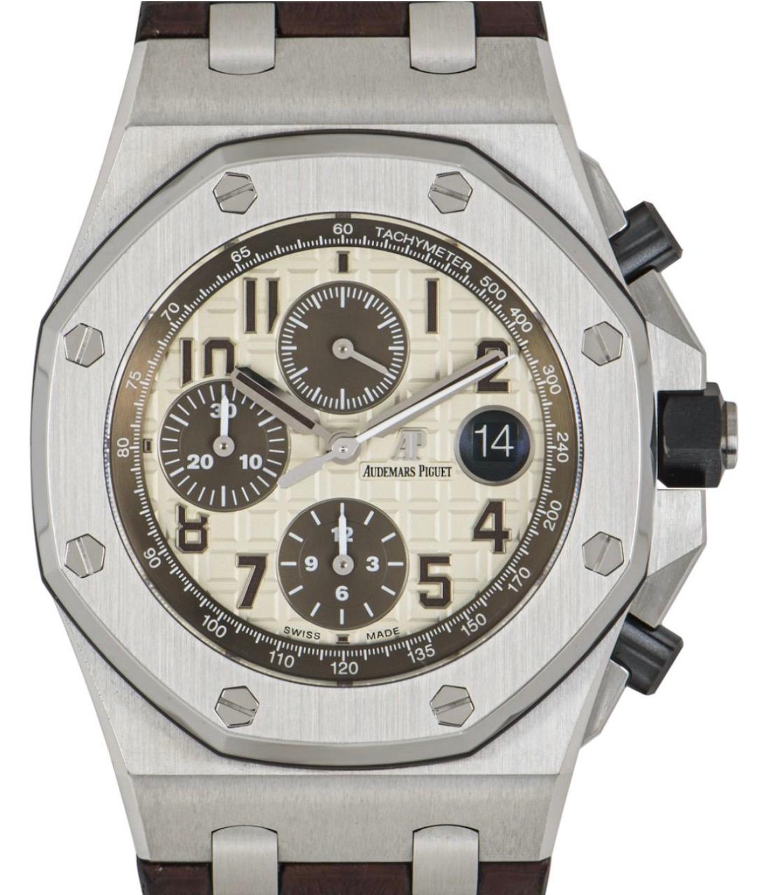 A 42mm men's Royal Oak Offshore Safari, crafted in stainless steel by Audemars Piguet. Features an ivory toned dial with a mega tapisserie pattern, 3 brown sub dials displaying a 60 second, 30 minute and 12 hour markers and a stainless steel fixed