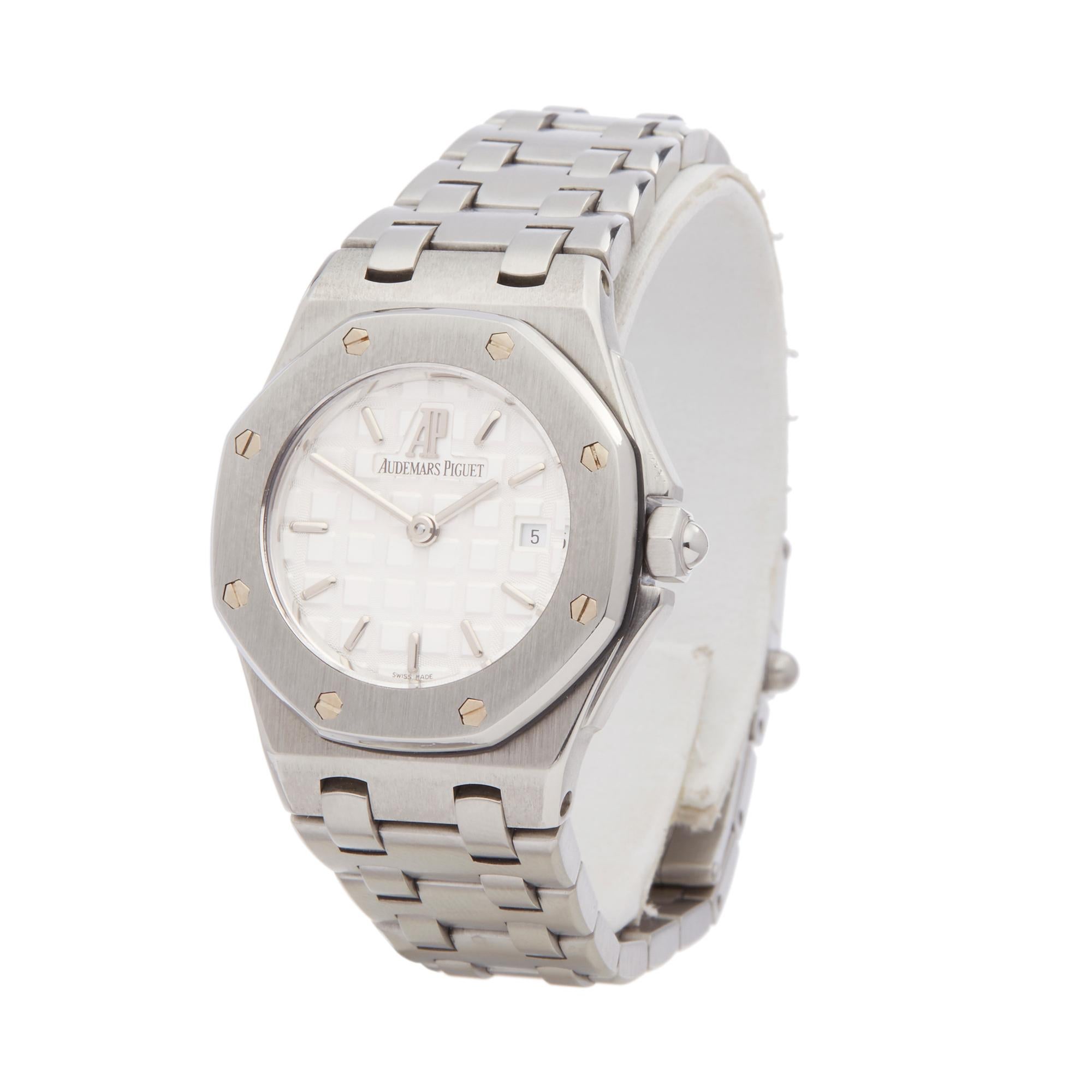 Ref: W6306
Manufacturer: Audemars Piguet
Model: Royal Oak 
Model Ref: 67150ST
Age: Circa 2000's
Gender: Ladies
Complete With: Xupes Presentation Pouch
Dial: White Baton
Glass: Sapphire Crystal
Movement: Quartz
Water Resistance: To Manufacturers
