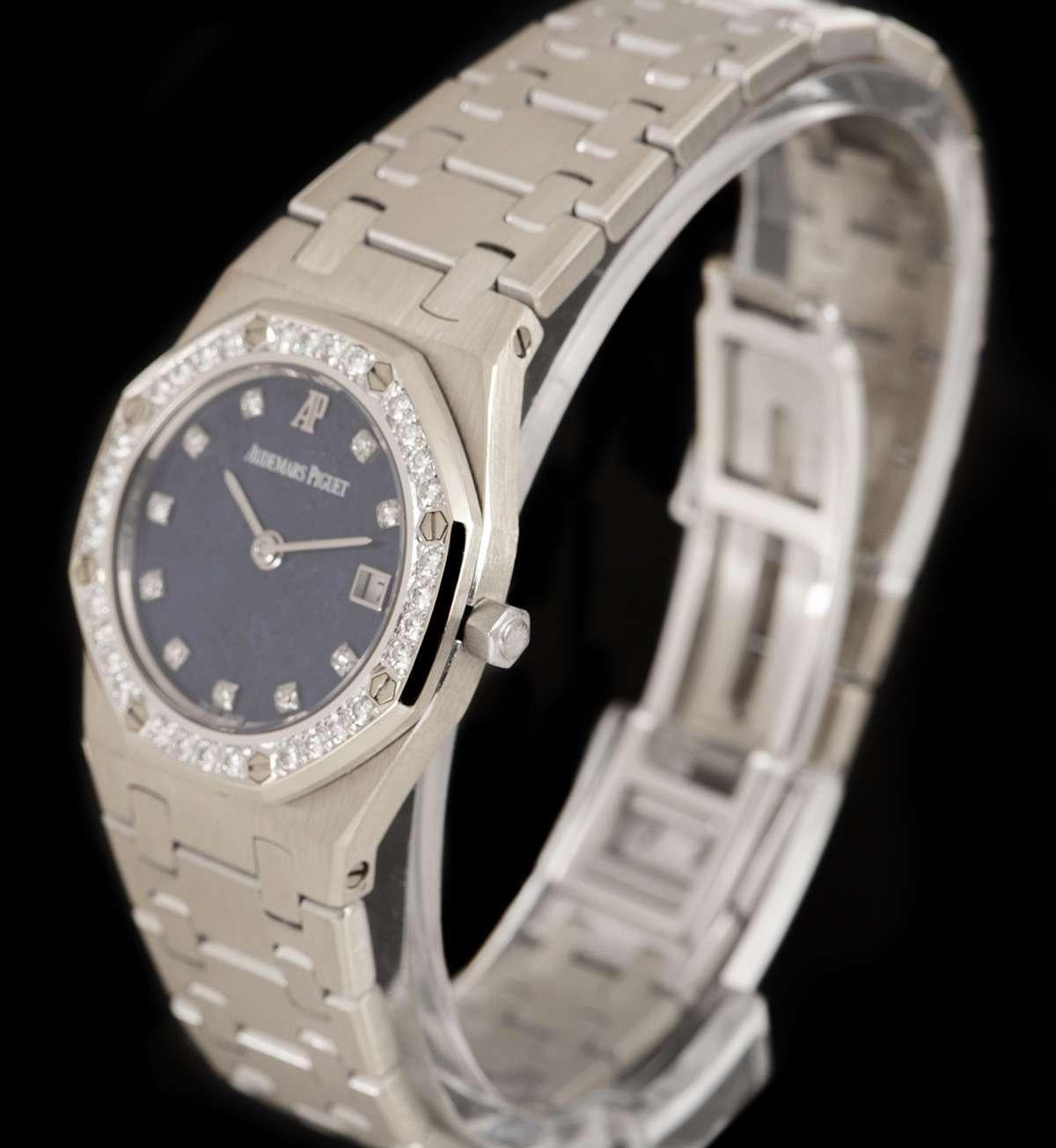 An 18k White Gold Royal Oak Ladies Wristwatch, rare lapis lazuli dial set with 10 applied round brilliant cut diamond hour markers, date at 3 0'clock, a fixed 18k white gold bezel set with 32 round brilliant diamonds and 8 iconic Audemars Piguet
