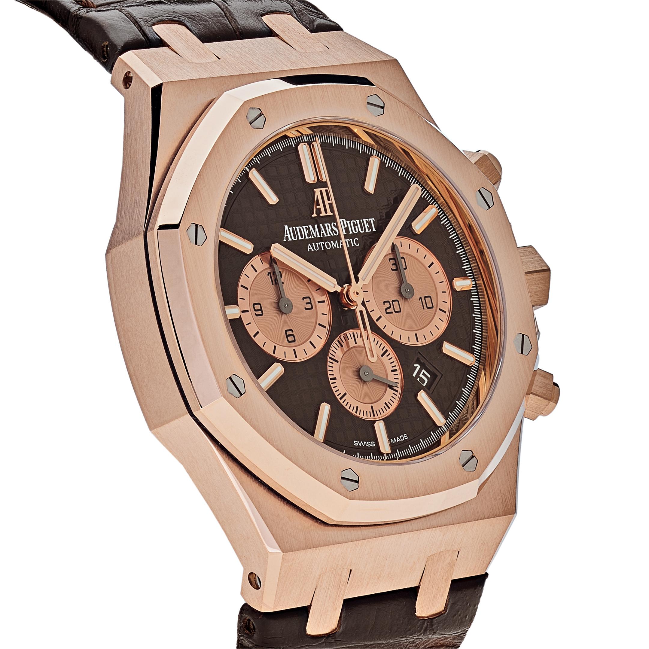 This Royal Oak Selfwinding Chronograph is designed in a 41mm 18-carat rose gold case and an octagonal bezel. It features the Grande Tapisserie pattern on the brown dial equipped with three rose gold-toned counters. The watch is complimented by a