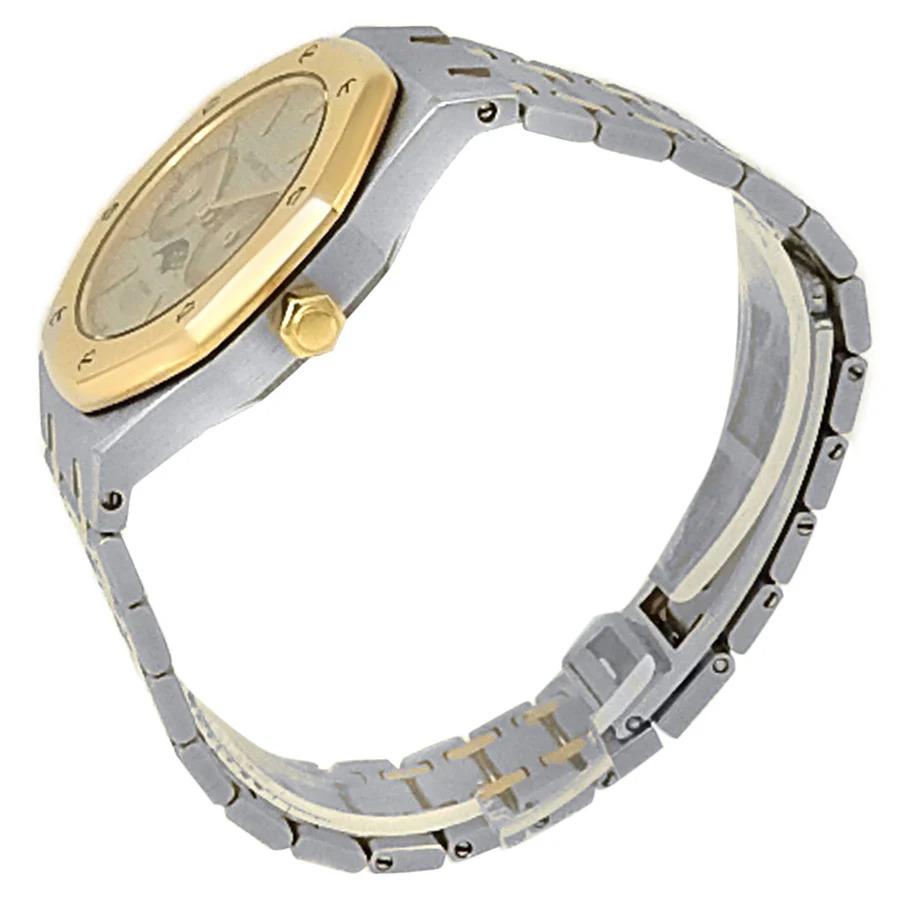 The Audemars Piguet Royal Oak 25594SA.OO.0789SA.01 stands out for its masterful fusion of two distinct precious metals: 18k yellow gold and stainless steel. This bi-metal construction, a hallmark of the 1980s and 90s luxury watch scene, gives the