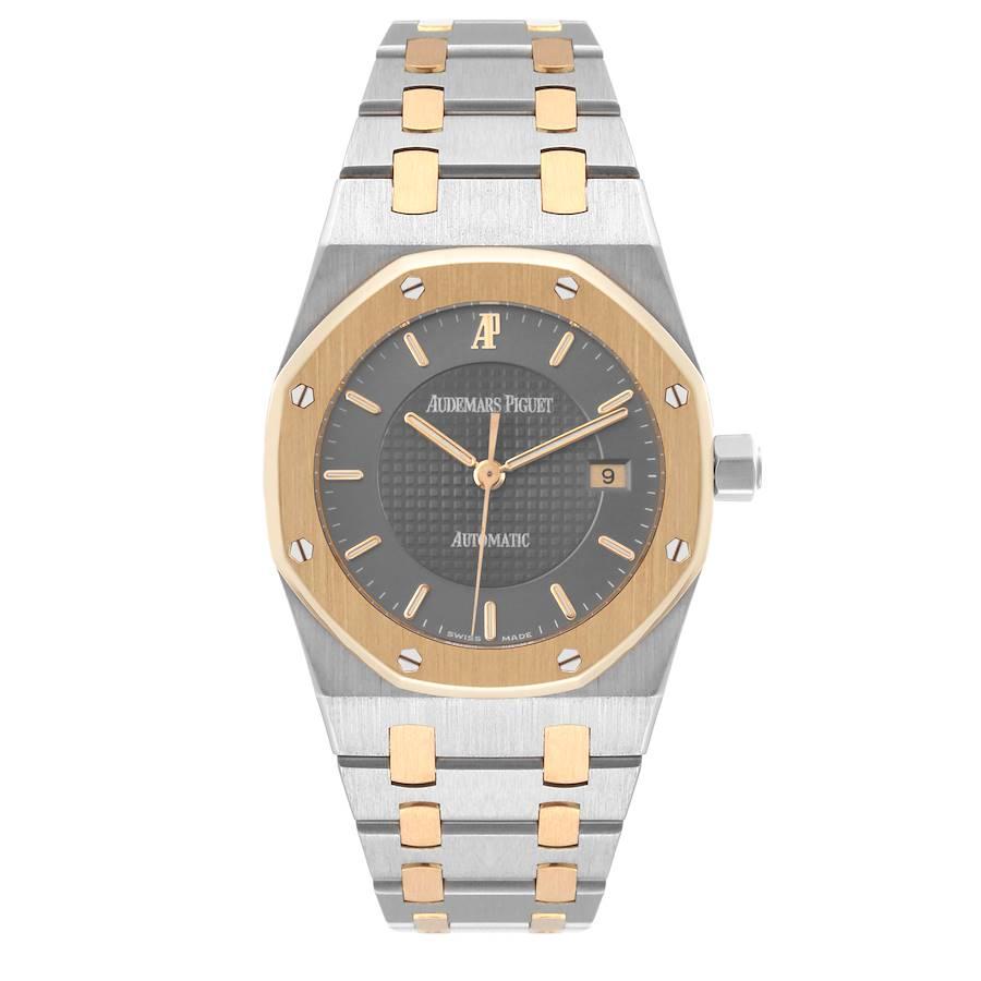 Audemars Piguet Royal Oak Stahl Gelbgold Automatik Herrenuhr 15050SA. Automatisches Uhrwerk mit Selbstaufzug. Gehäuse aus Edelstahl und 18 Karat Gelbgold mit einem Durchmesser von 33,0 mm. Gehäuseboden aus Saphirglas. Lünette aus 18 Karat Gelbgold