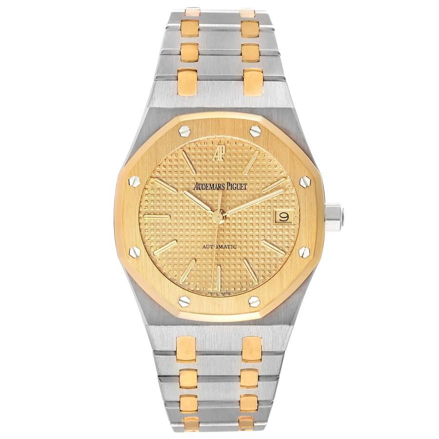 Audemars Piguet Royal Oak Steel Yellow Gold Champagne Dial Mens Watch 14790SA. Automatic self-winding movement. Stainless steel and 18K yellow gold case 36.0 mm in diameter. 18K yellow gold bezel punctuated with 8 signature screws. Scratch resistant