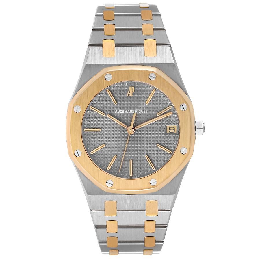 Audemars Piguet Royal Oak Steel Yellow Gold Gray Dial Mens Watch 56023SA. Quartz movement. Stainless steel and yellow gold case 36.0 mm in diameter. Hexagonal steel winding-crown. 18k yellow gold octagonal bezel with 8 hexagonal white gold screws