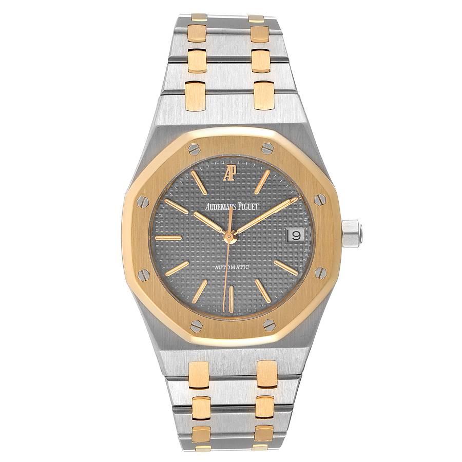 Audemars Piguet Royal Oak Steel Yellow Gold Mens Watch 14790SA Box Papers. Automatic self-winding movement. Stainless steel and 18K yellow gold case 36.0 mm in diameter. 18K yellow gold bezel punctuated with 8 signature screws. Scratch resistant